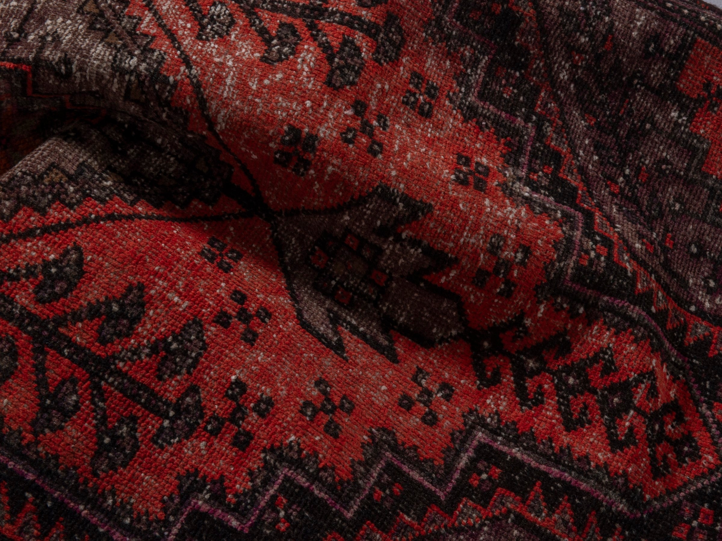 Persian Zanjan accent rug in deep red and charcoal, view 13 of 16