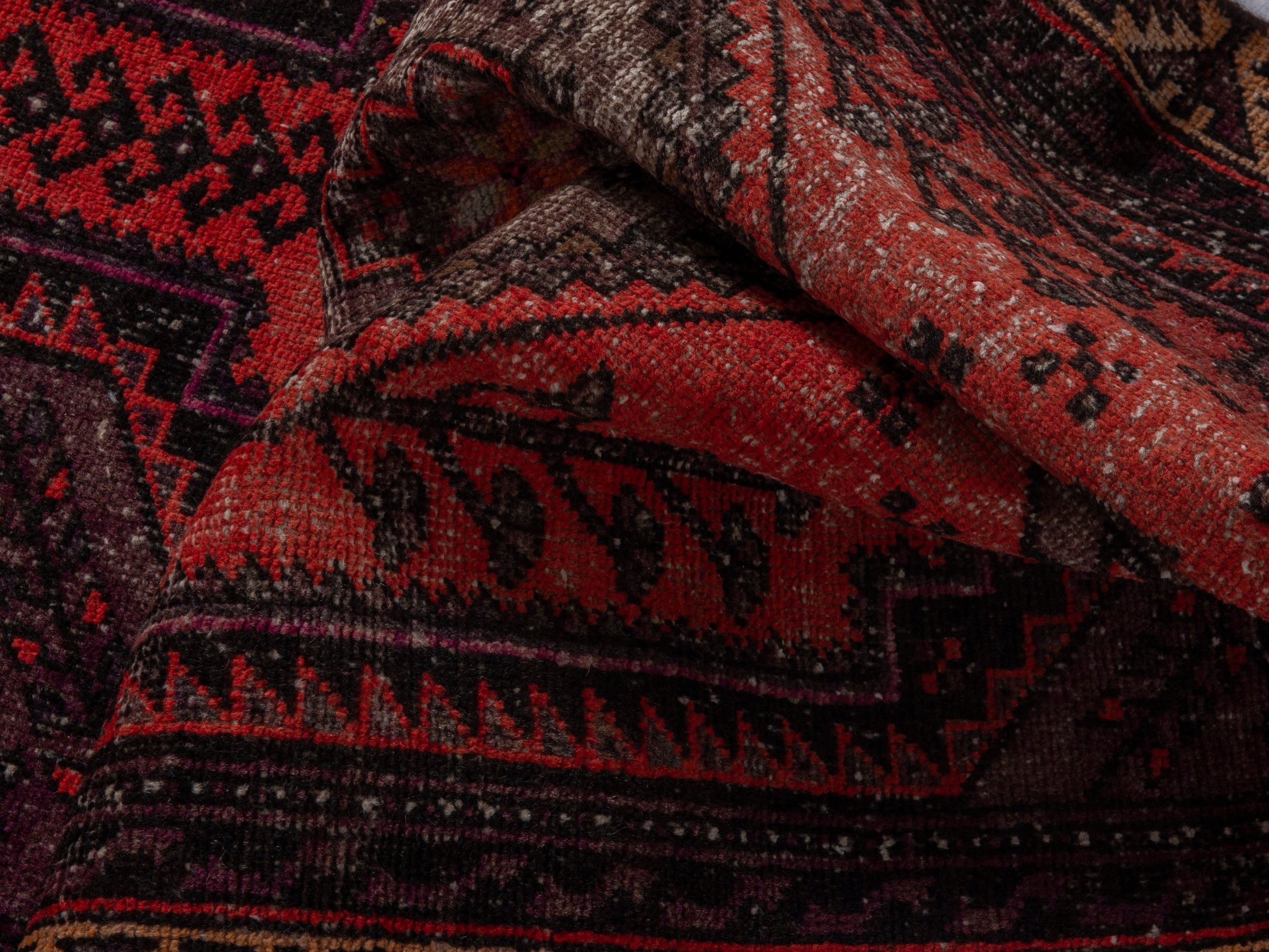 Persian Zanjan accent rug in deep red and charcoal, view 15 of 16