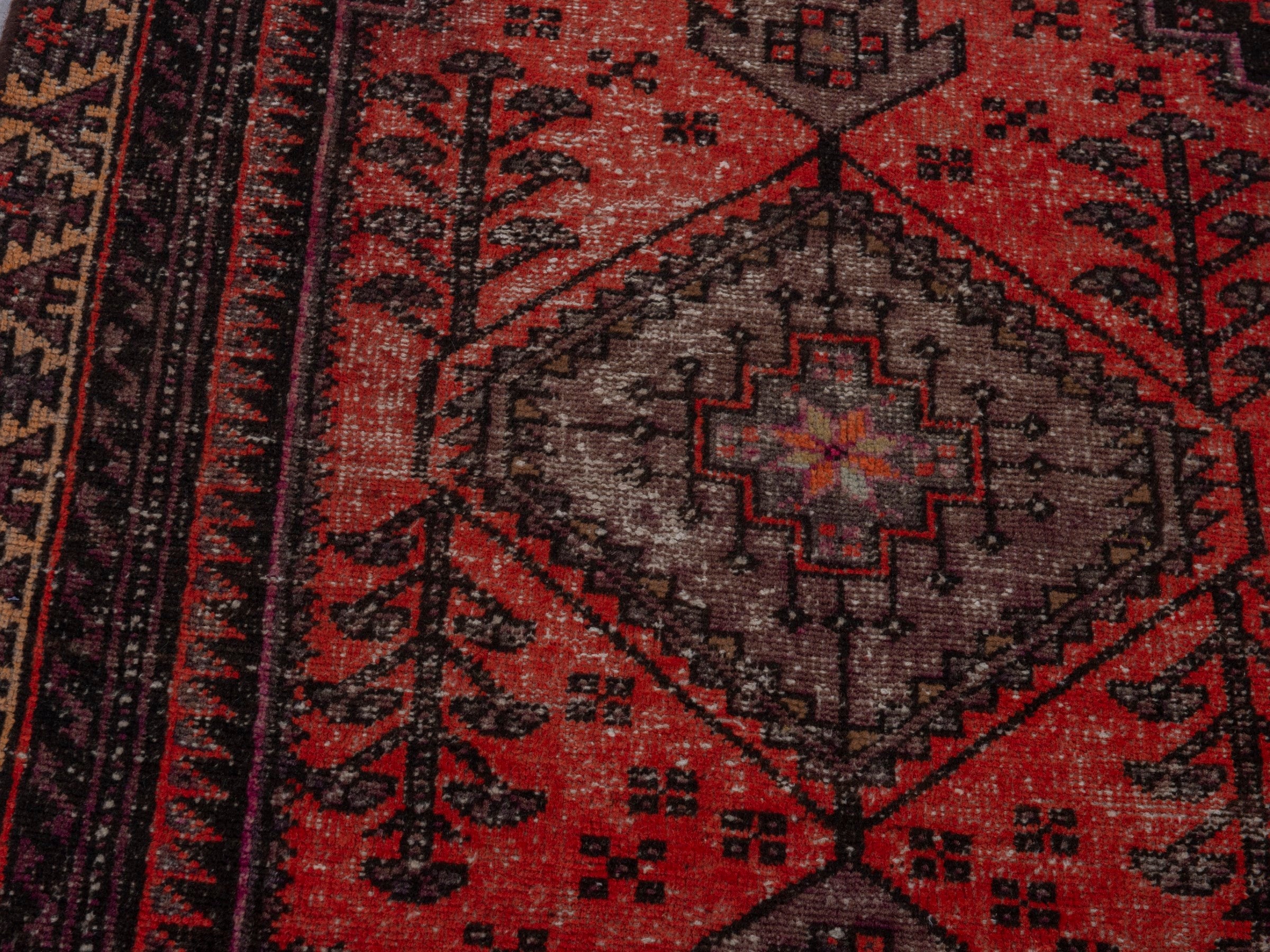 Persian Zanjan accent rug in deep red and charcoal, view 6 of 16