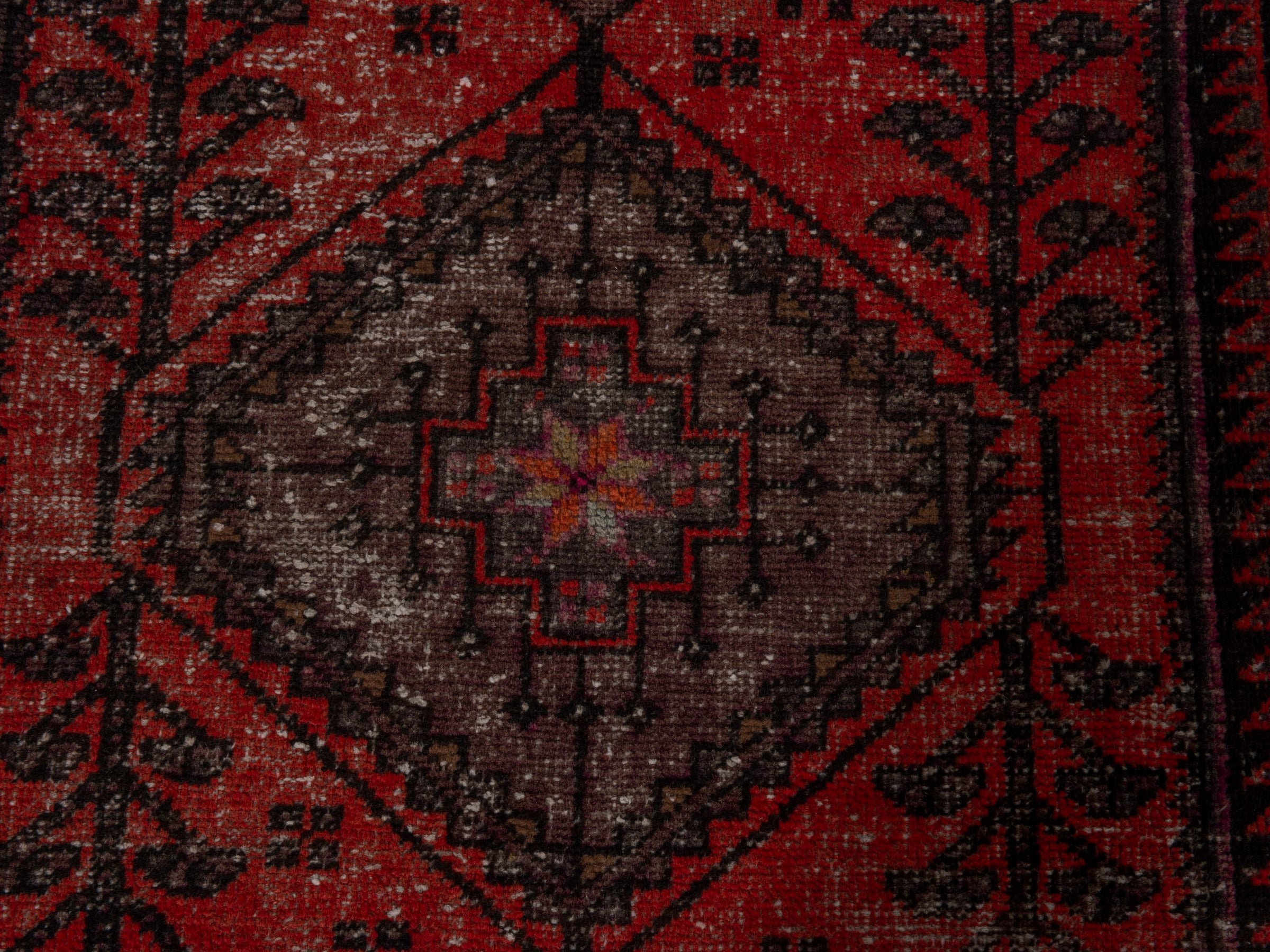 Persian Zanjan accent rug in deep red and charcoal, view 9 of 16