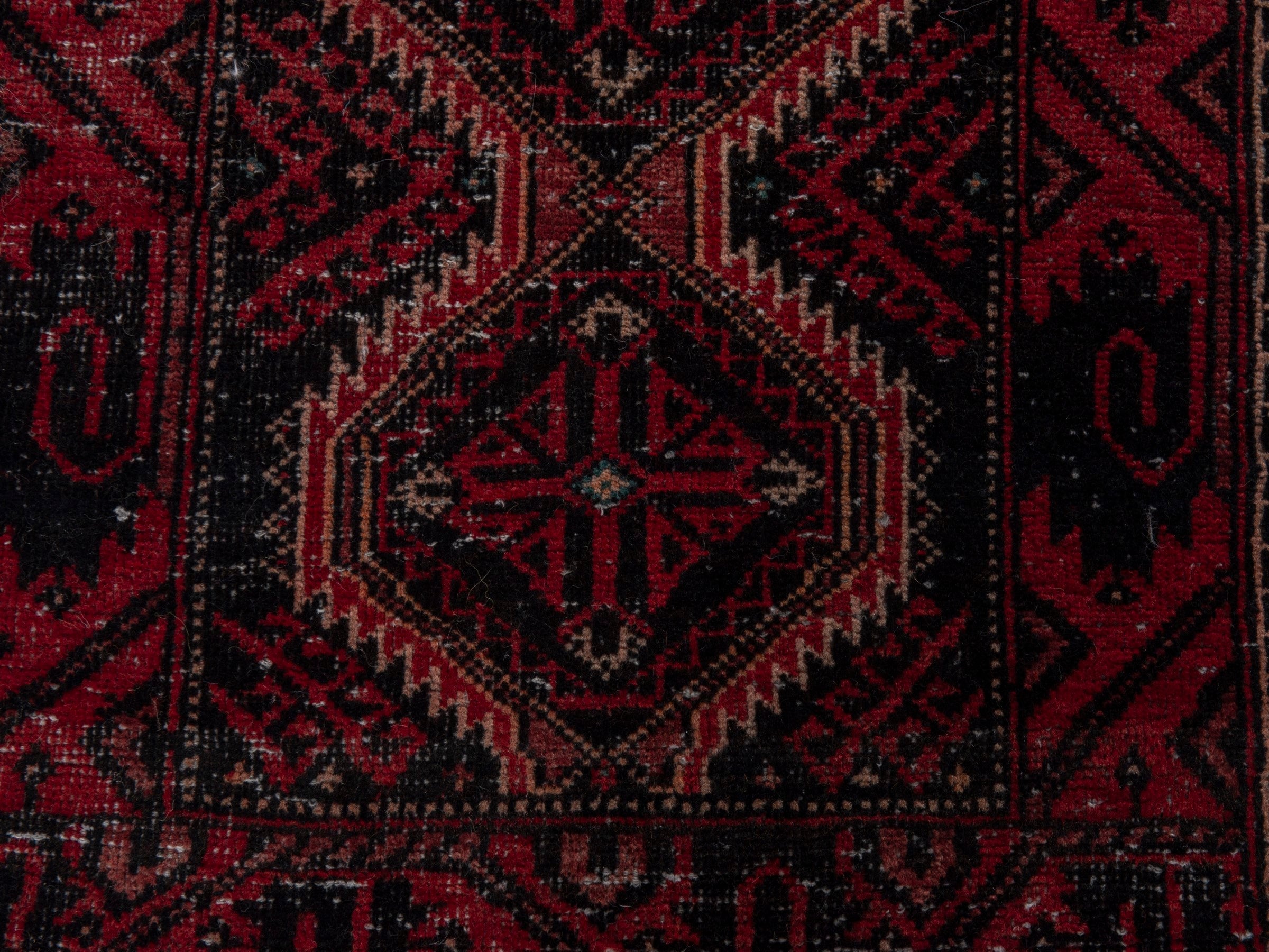 Persian Baluch runner rug in burgundy and deep red, view 10 of 17