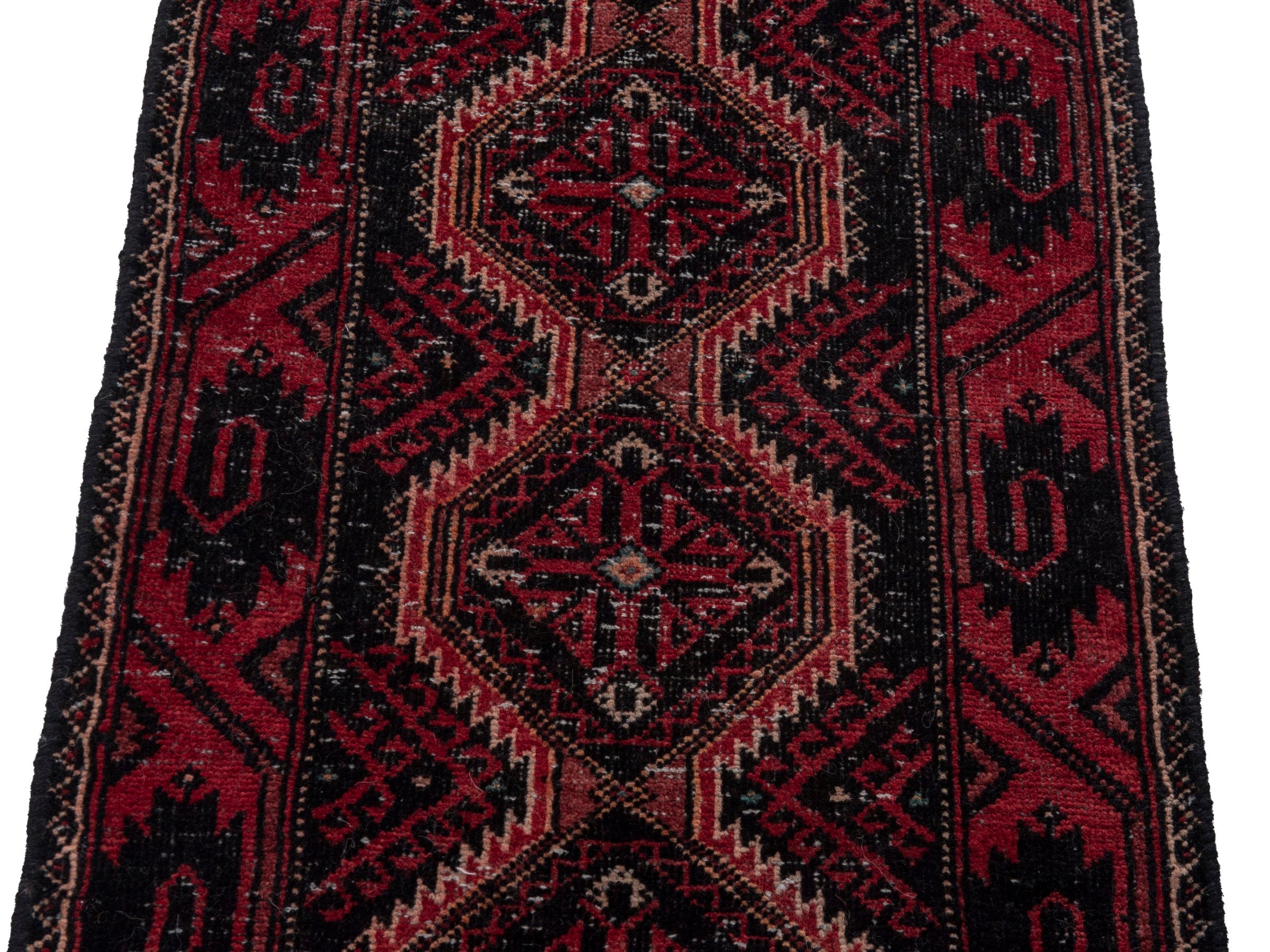 Persian Baluch runner rug in burgundy and deep red, view 6 of 17