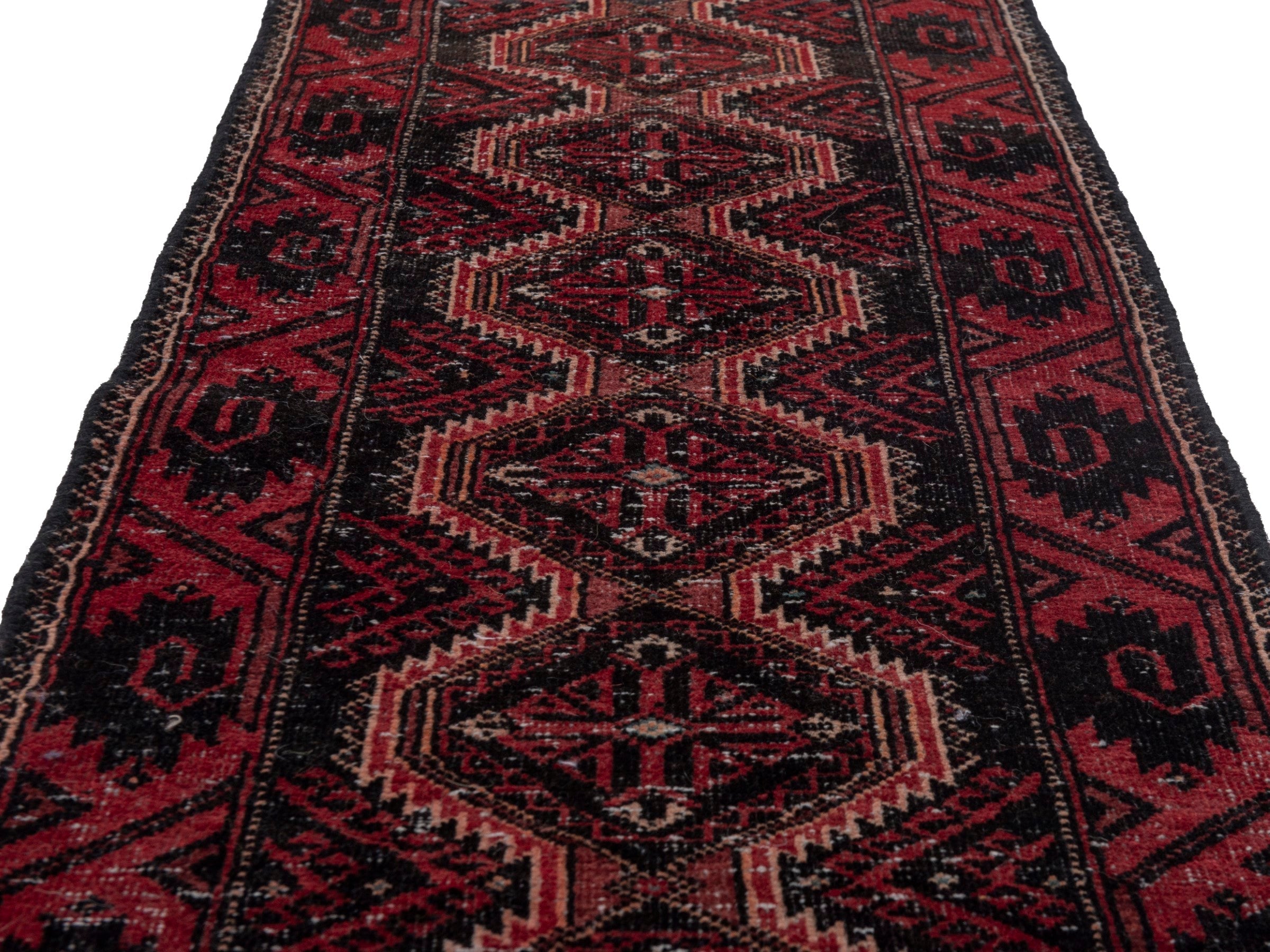 Persian Baluch runner rug in burgundy and deep red, view 9 of 17