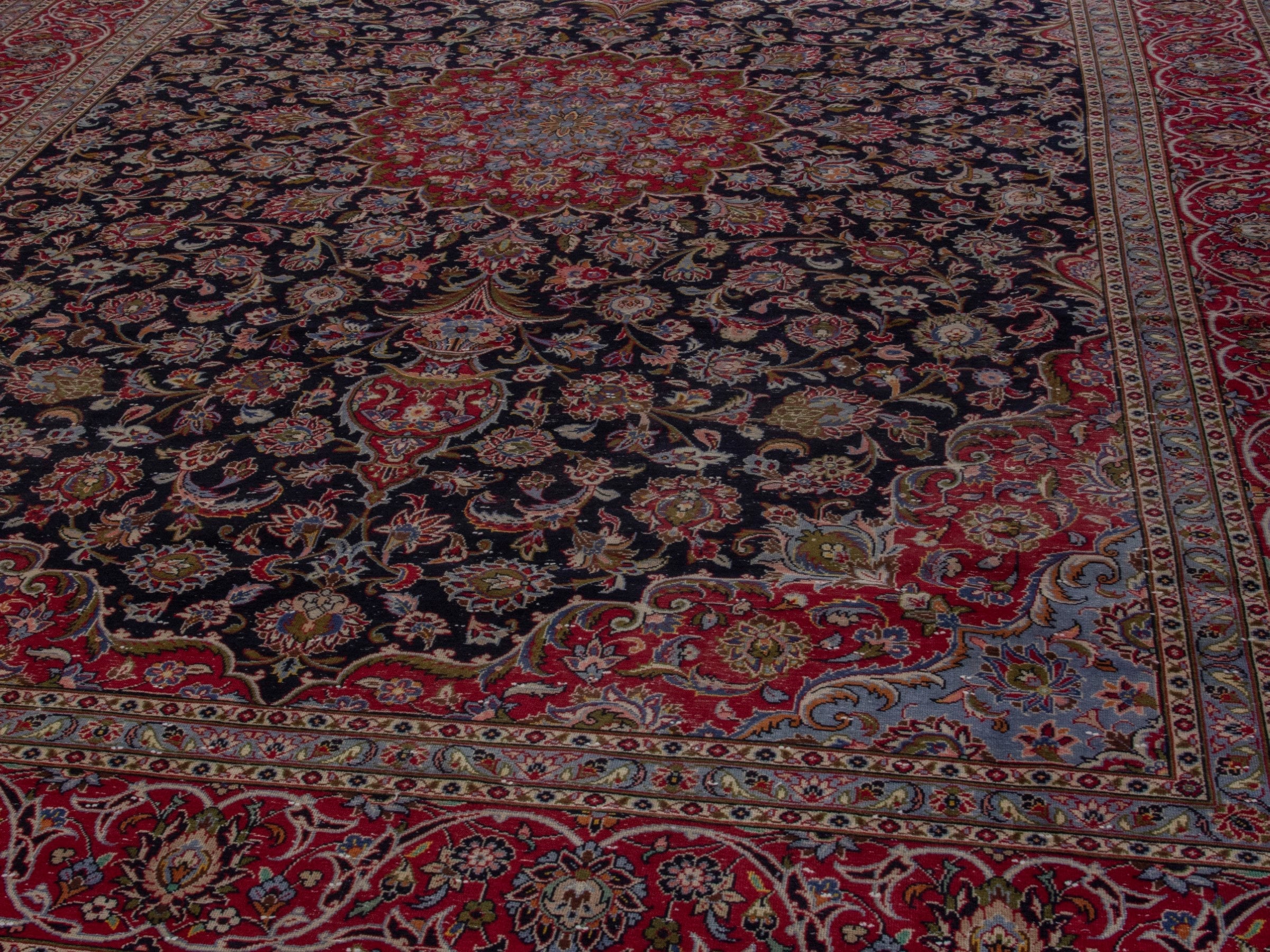 Persian Kashan oversized rug in charcoal and burgundy, view 10 of 19