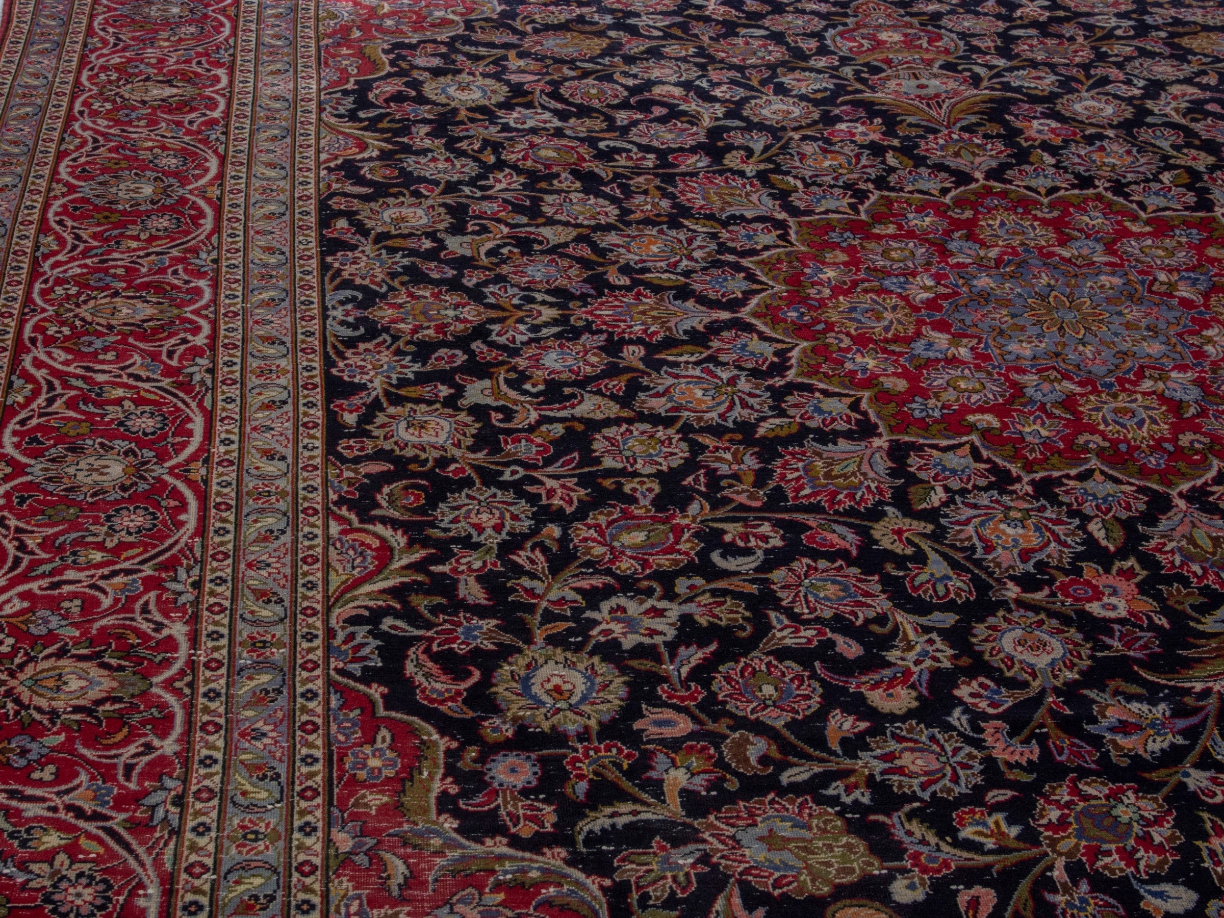 Persian Kashan oversized rug in charcoal and burgundy, view 7 of 19