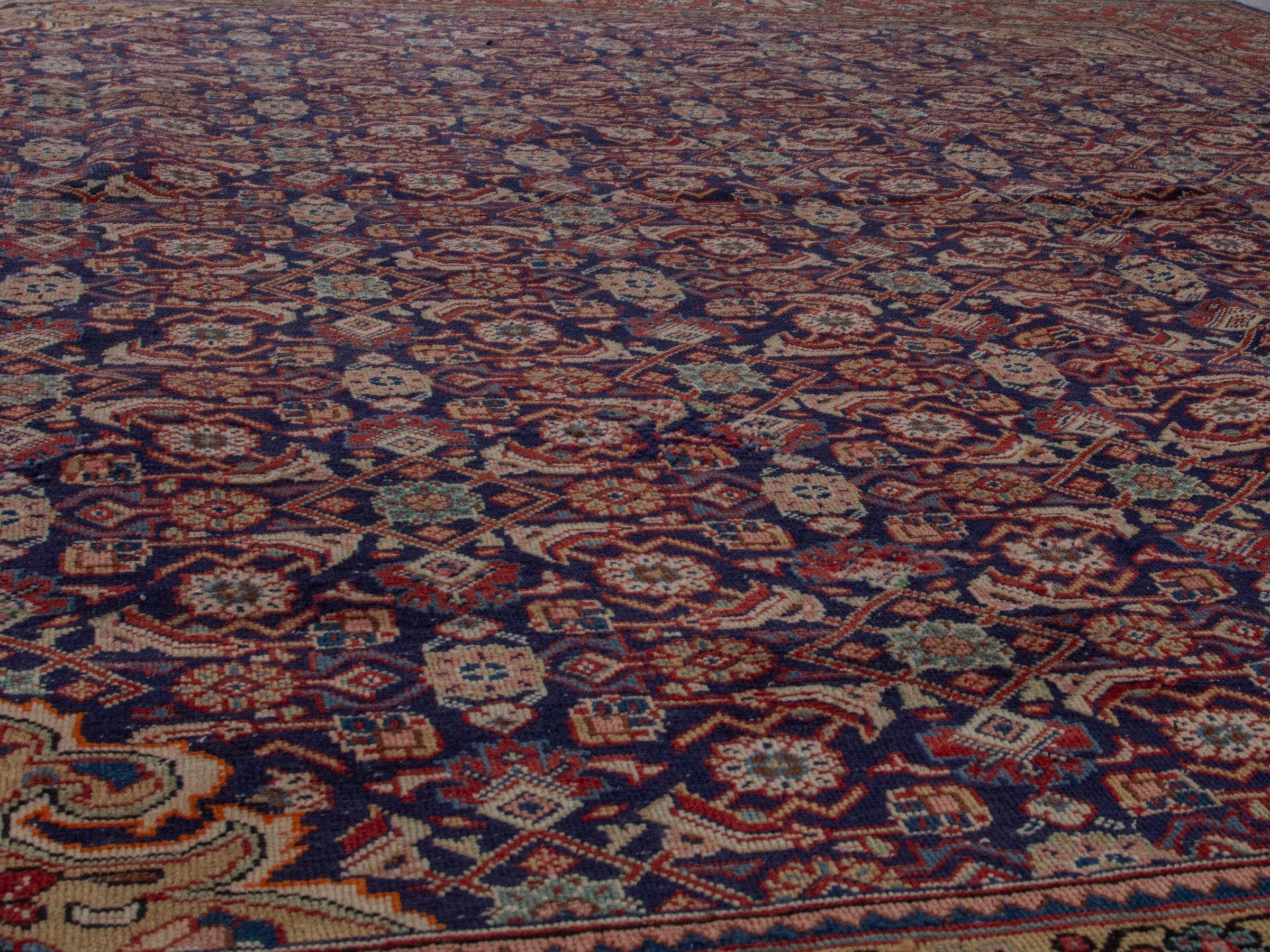 Persian Mahal oversized rug in navy and deep red, view 10 of 20