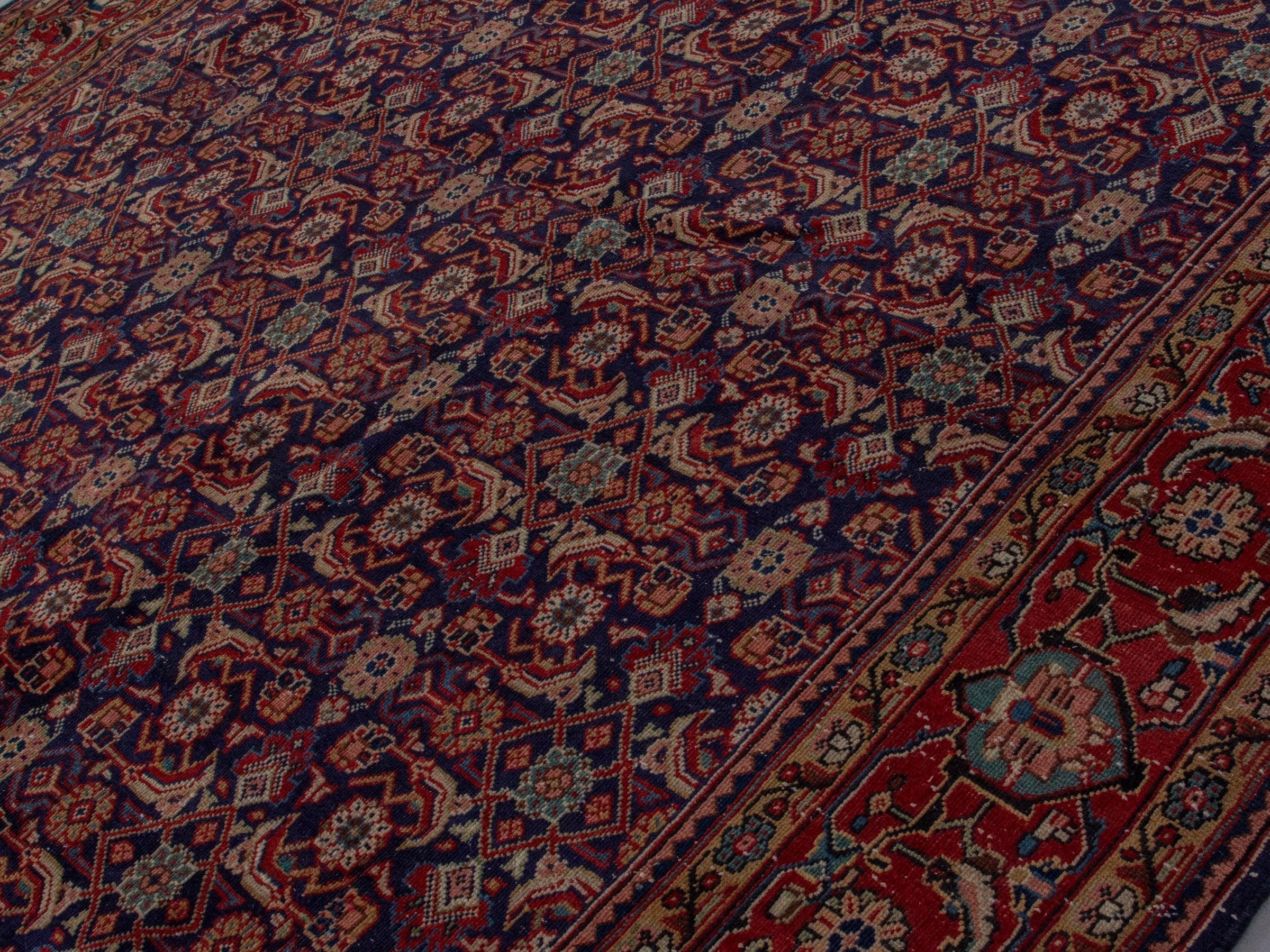Persian Mahal oversized rug in navy and deep red, view 4 of 20
