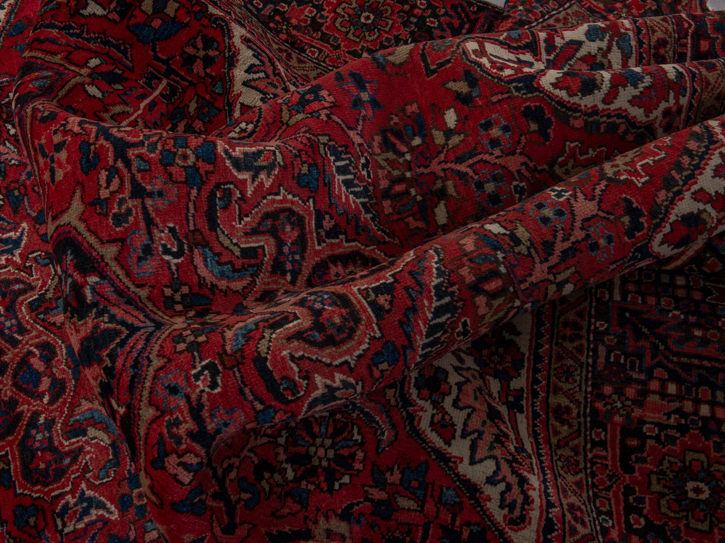 Persian Heriz oversized rug in deep red and burgundy, view 17 of 21