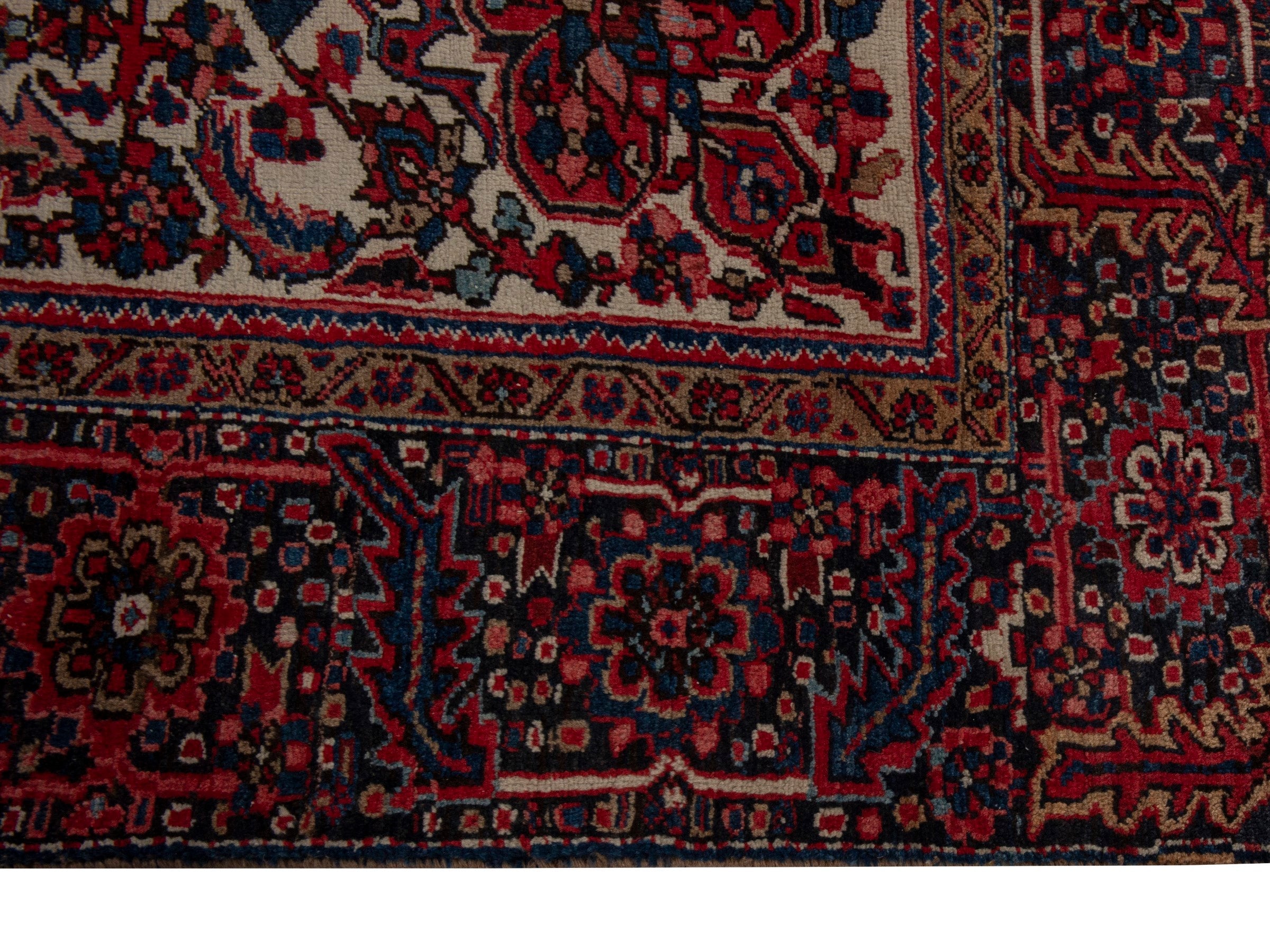 Persian Heriz oversized rug in deep red and burgundy, view 5 of 21