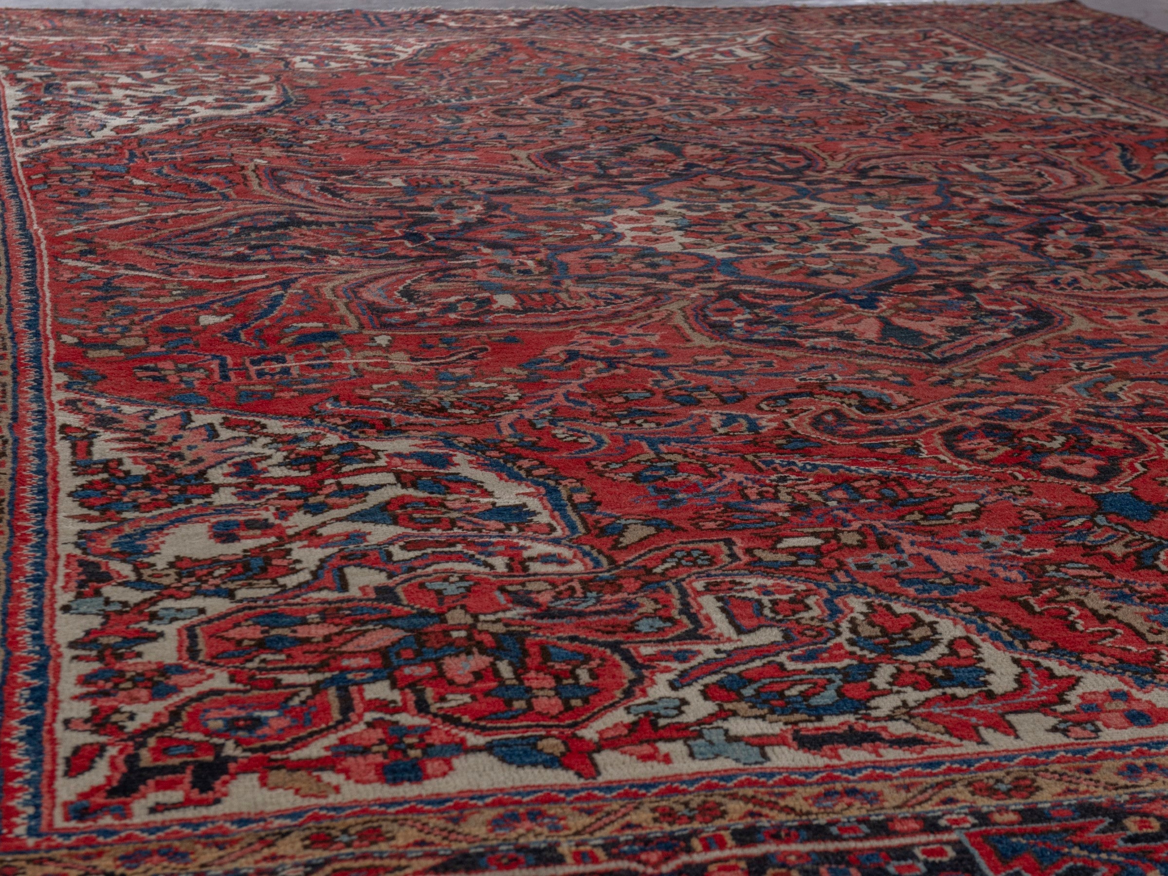 Persian Heriz oversized rug in deep red and burgundy, view 9 of 21