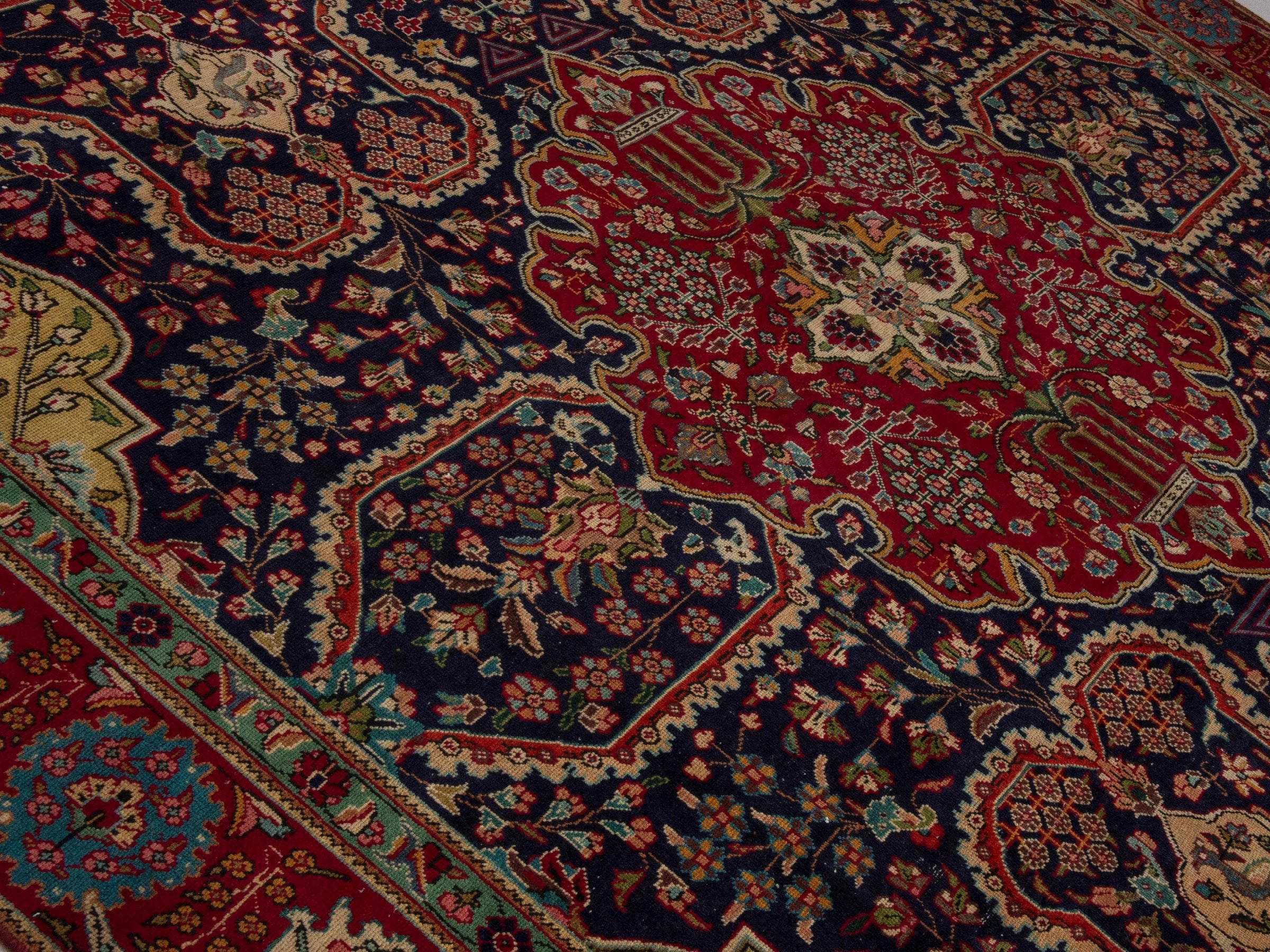 Persian Tabriz oversized rug in navy and deep red, view 4 of 24