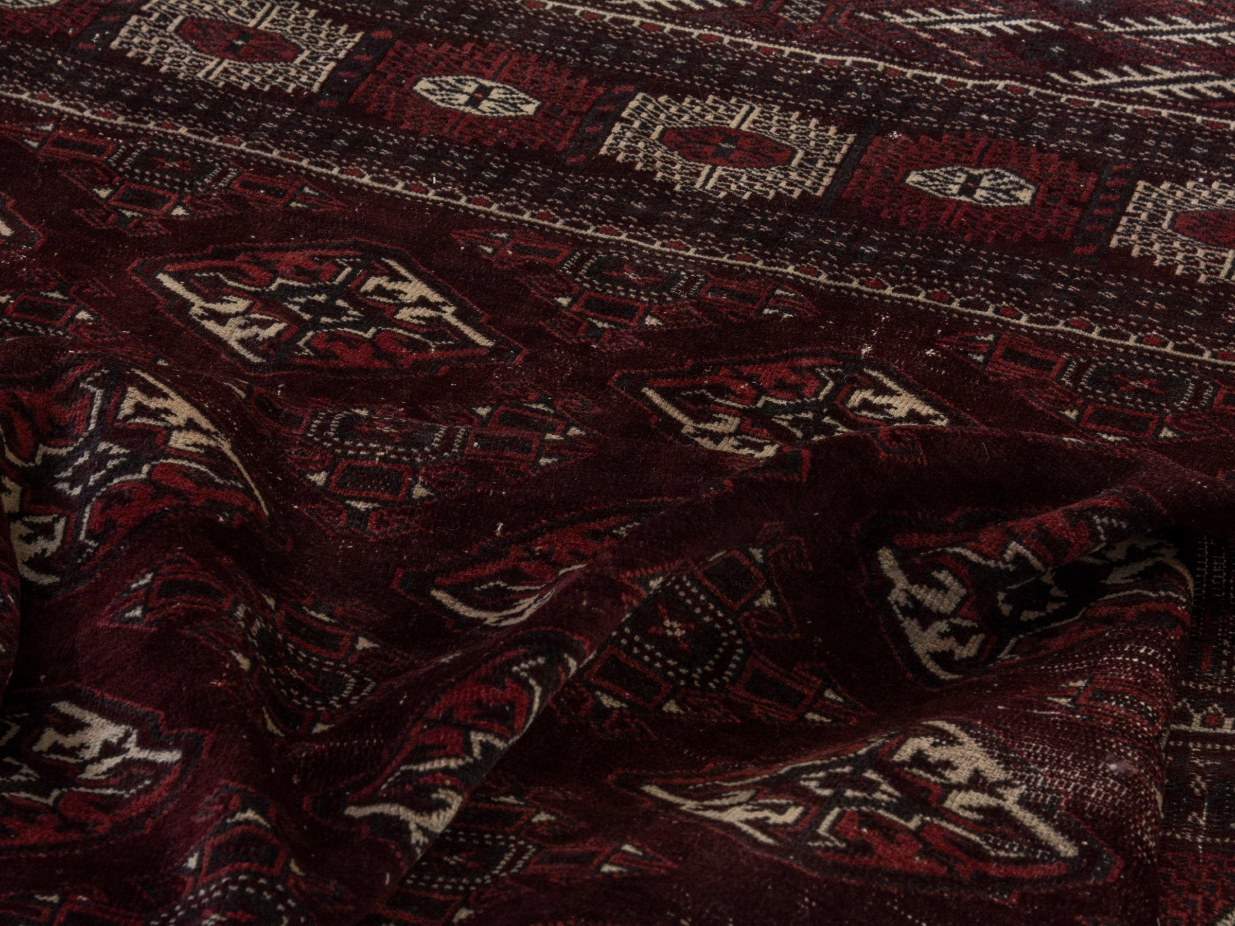 Persian Torkaman oversized rug in burgundy and cream, view 16 of 19