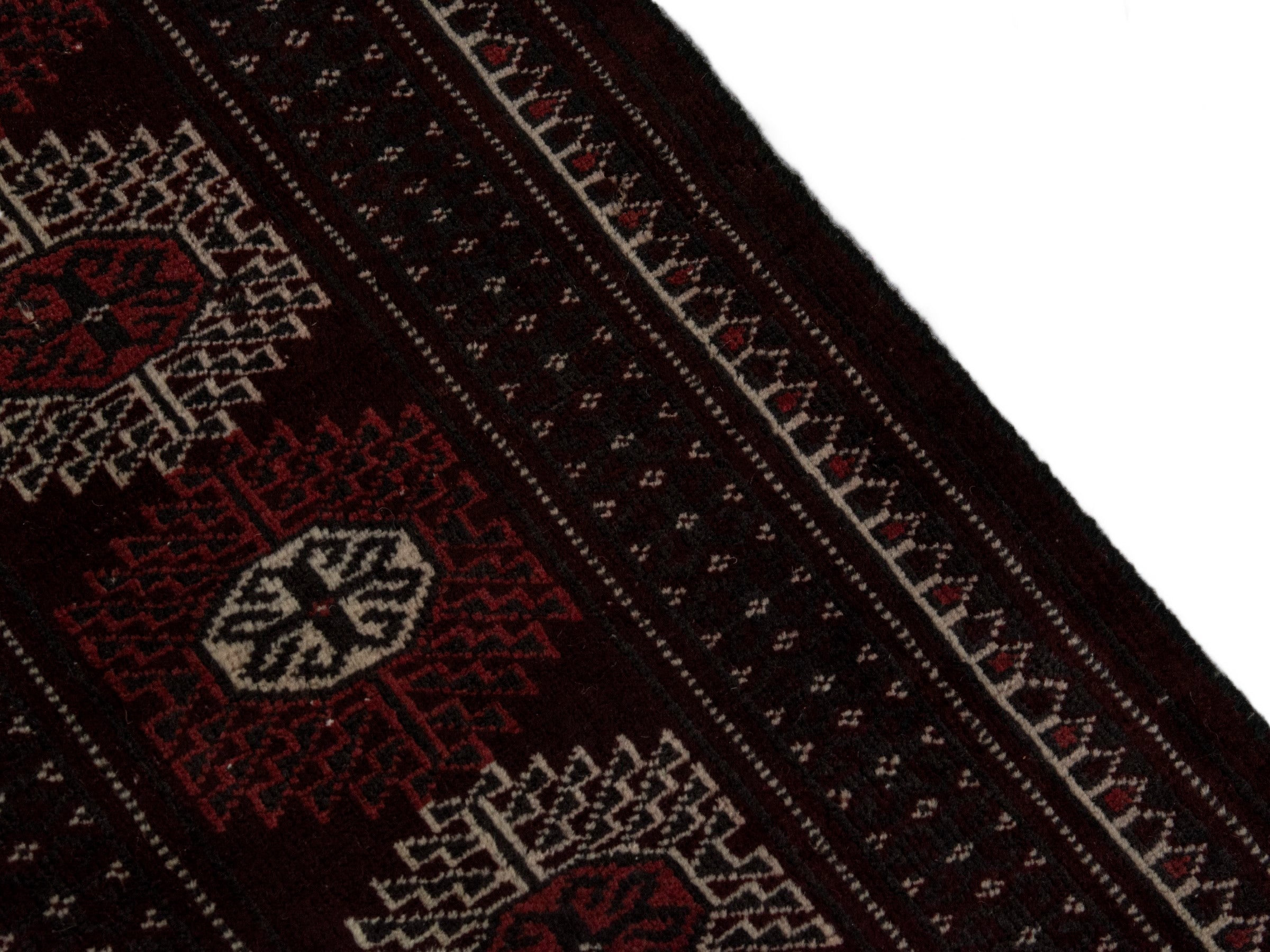 Persian Torkaman oversized rug in burgundy and cream, view 7 of 19