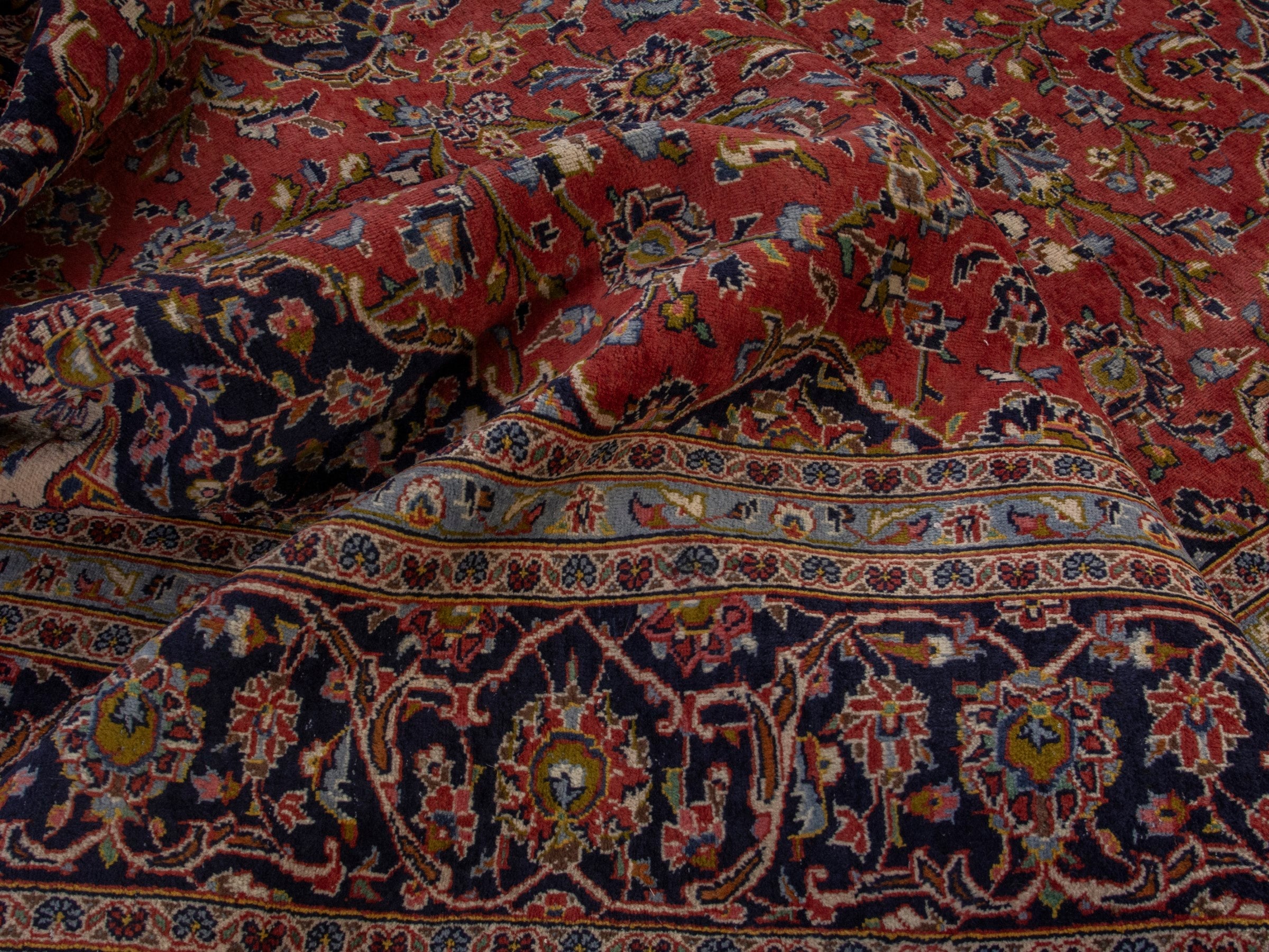 Persian Kashan oversized rug in rust and deep indigo, view 18 of 20