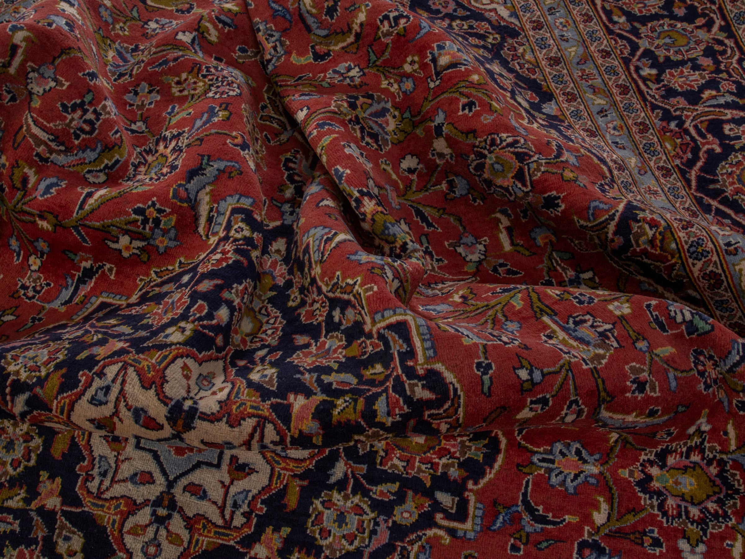 Persian Kashan oversized rug in rust and deep indigo, view 19 of 20