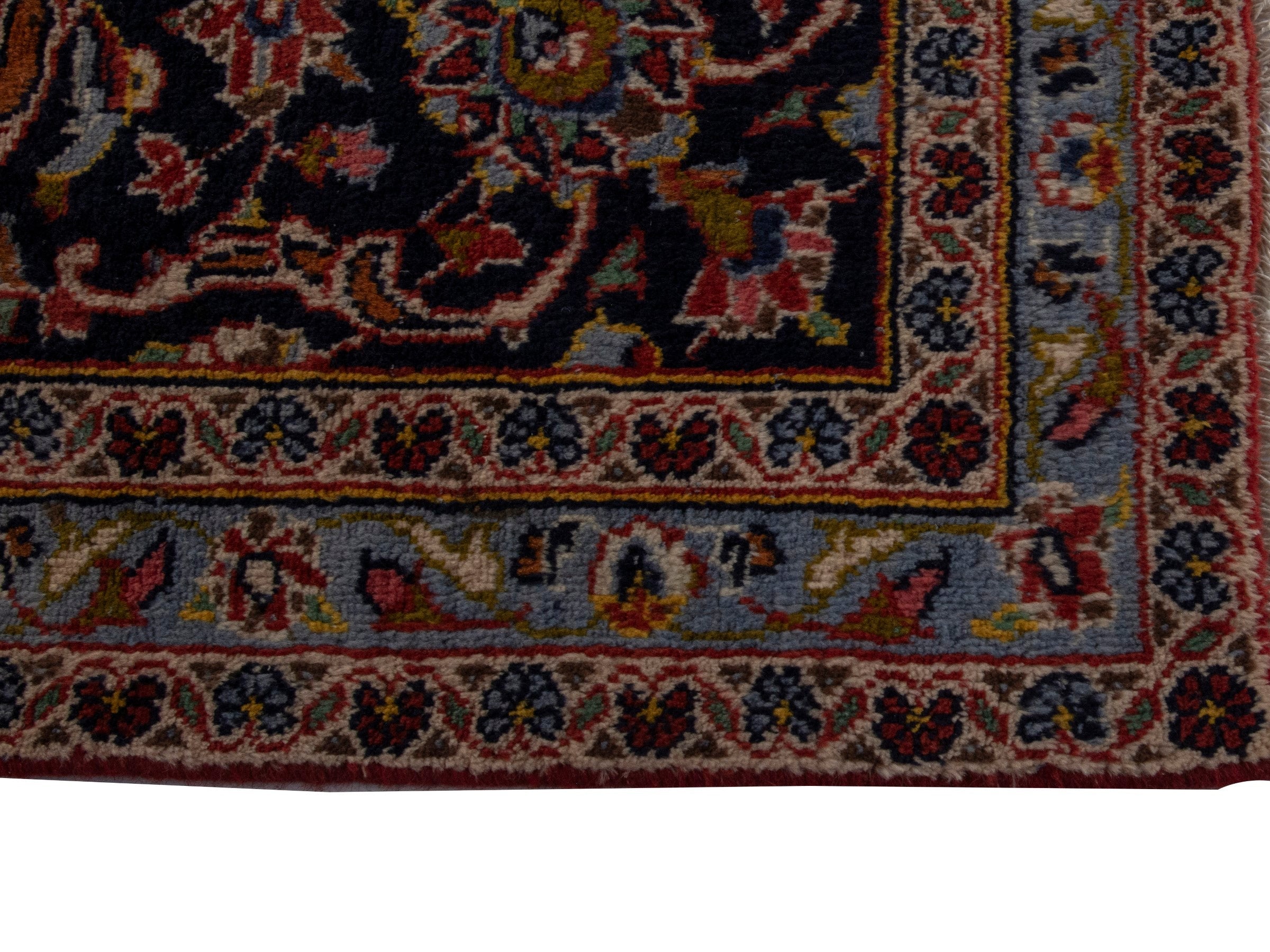 Persian Kashan oversized rug in rust and deep indigo, view 5 of 20