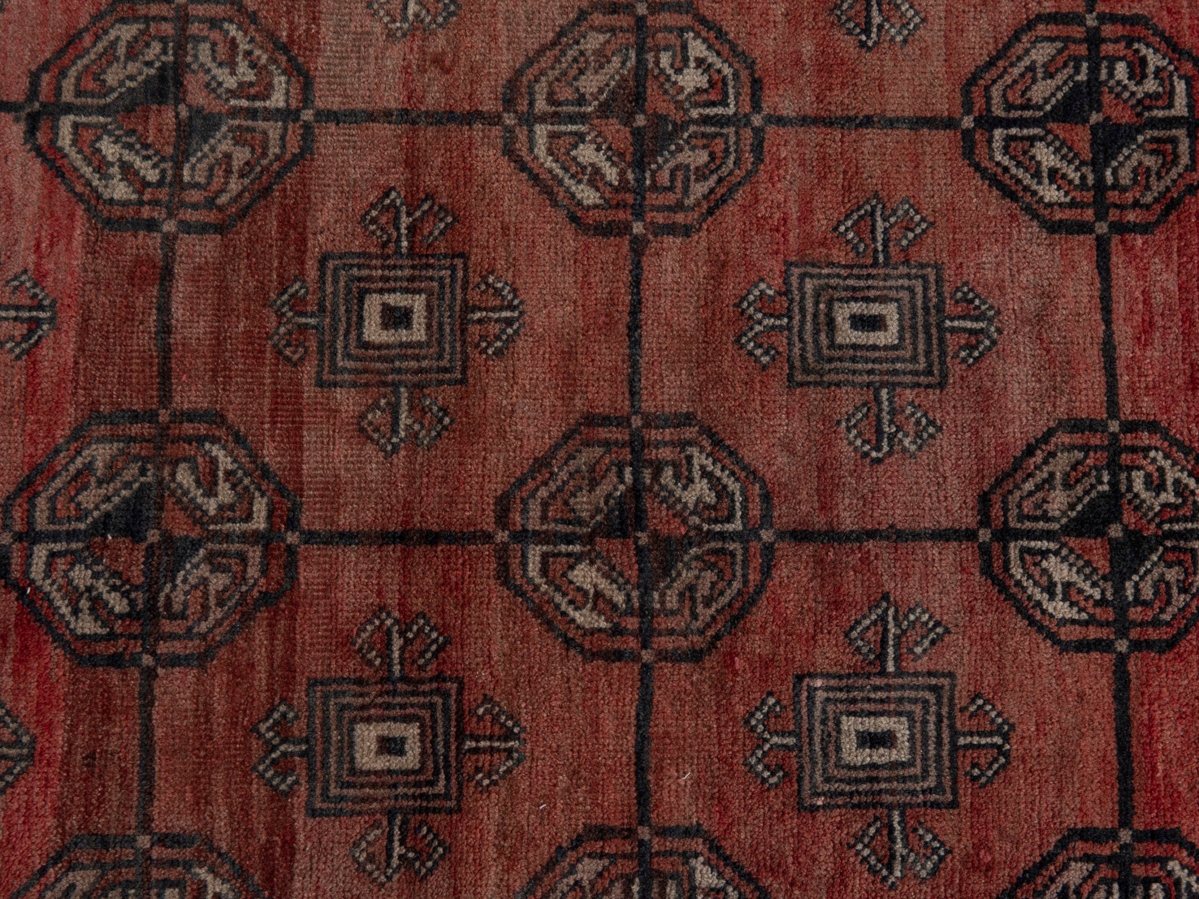 Persian Torkaman accent rug in terracotta and dark brown, view 6 of 8