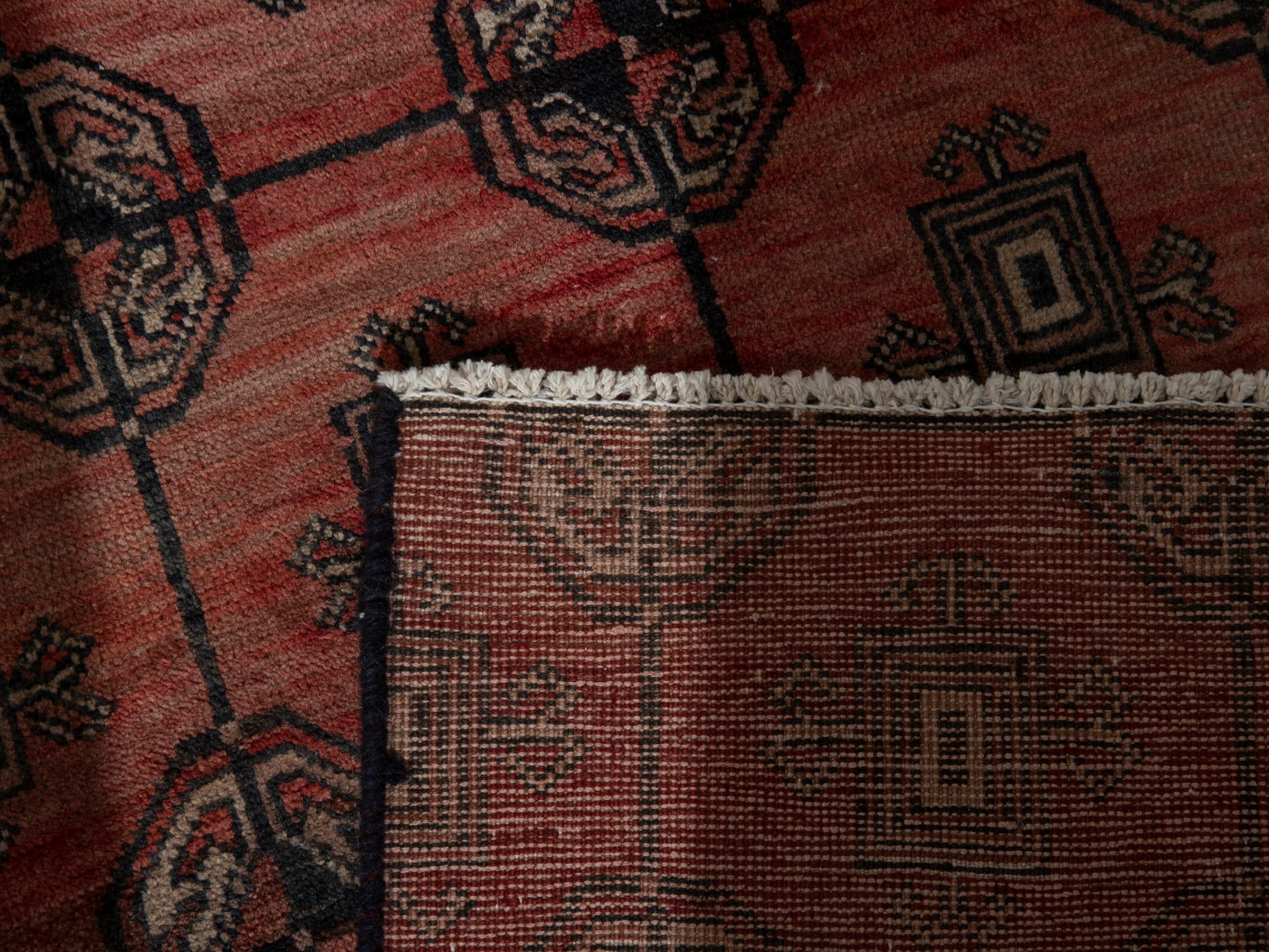 Persian Torkaman accent rug in terracotta and dark brown, view 7 of 8
