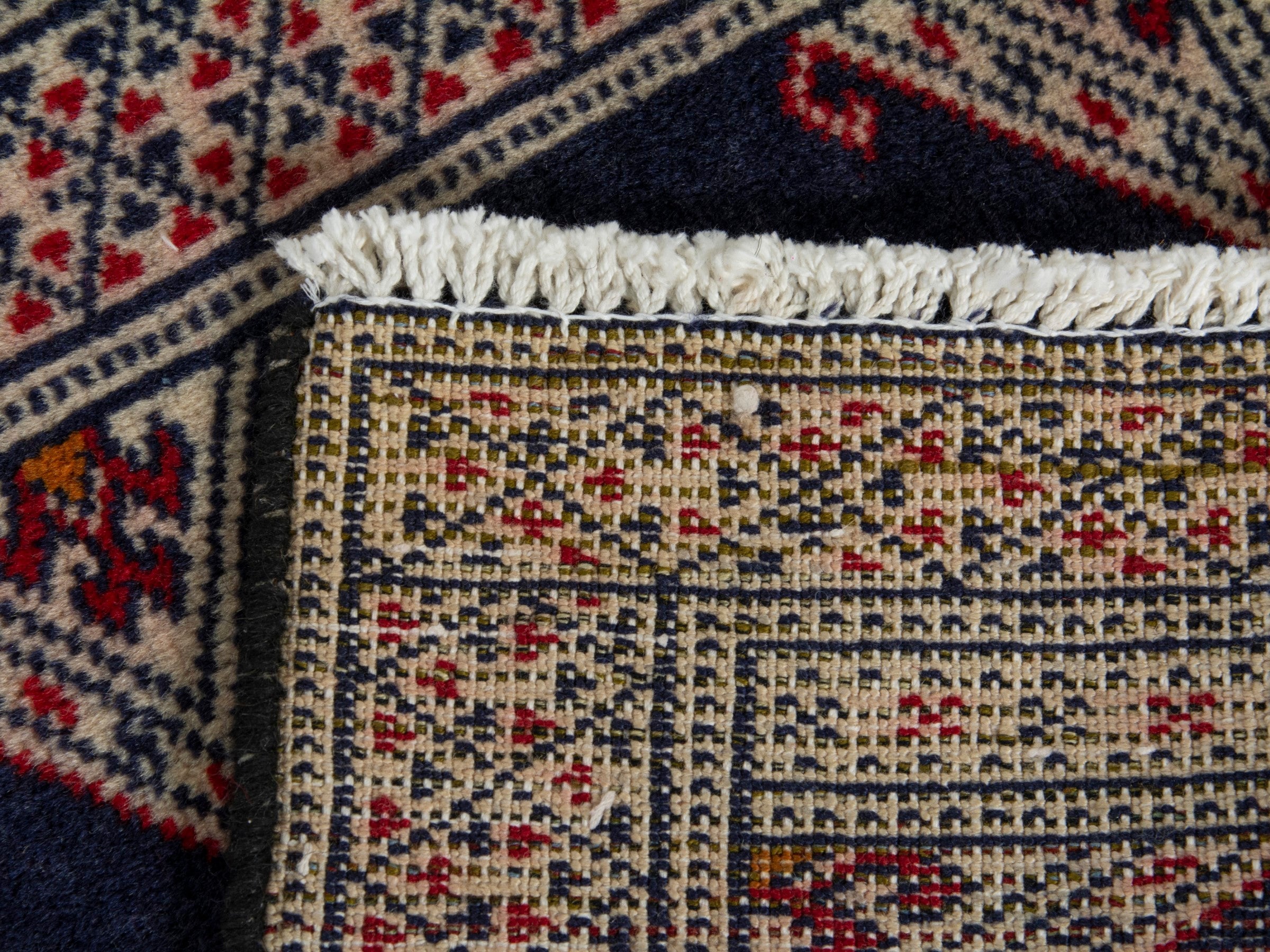Persian Torkaman accent rug in navy and cream, view 8 of 8