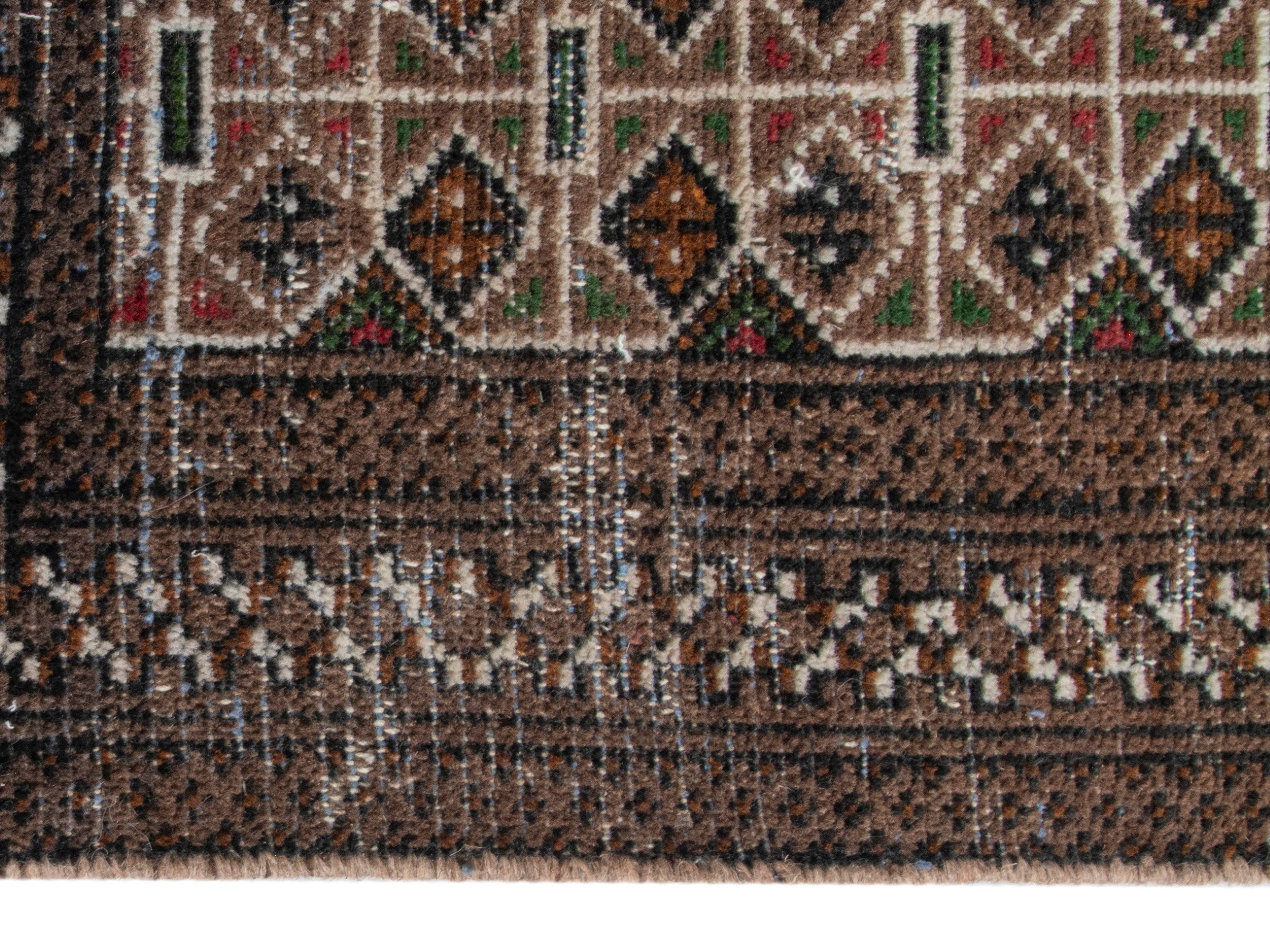 Persian Torkaman accent rug in dark brown and cream, view 3 of 6