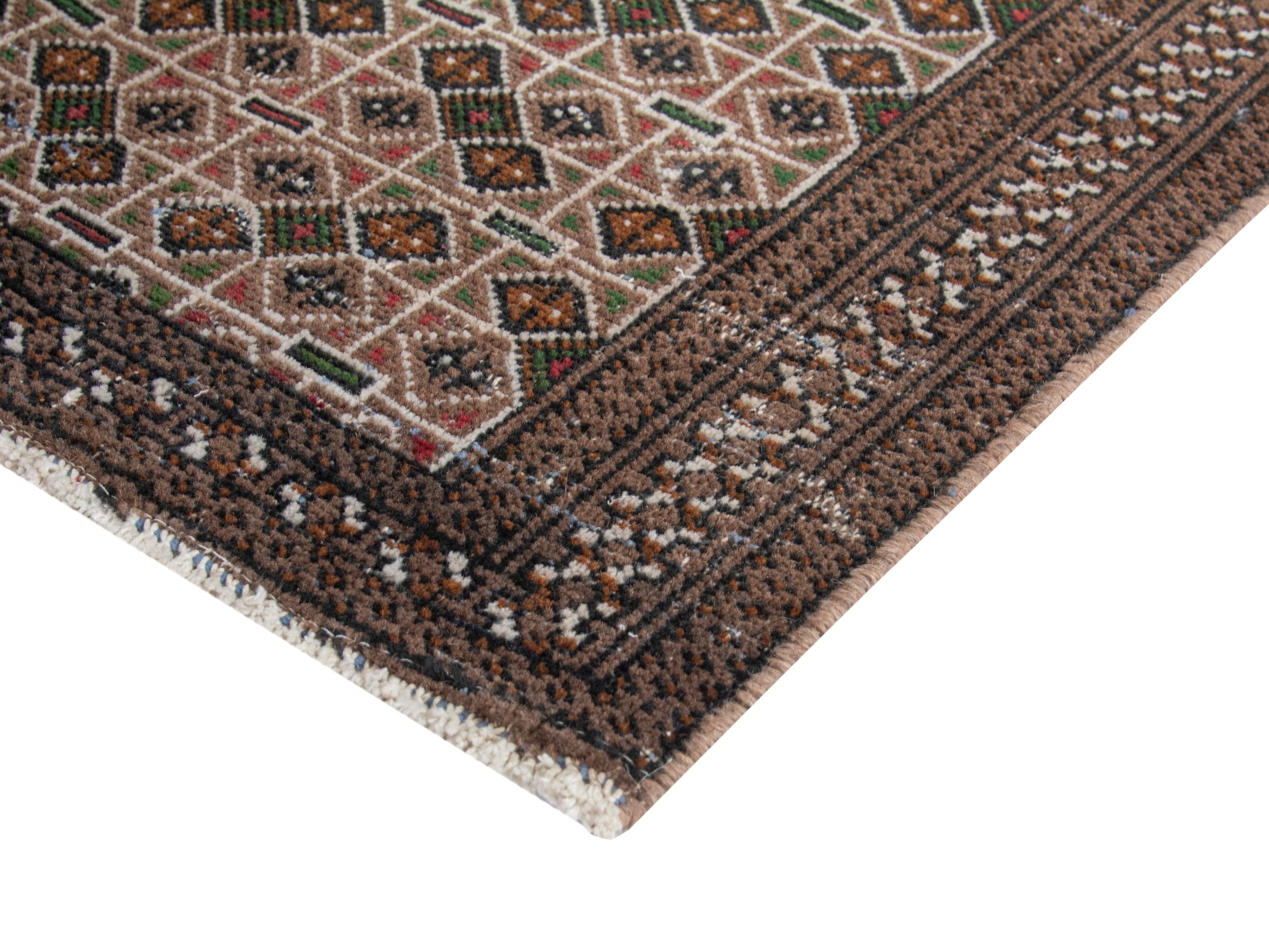 Persian Torkaman accent rug in dark brown and cream, view 4 of 6