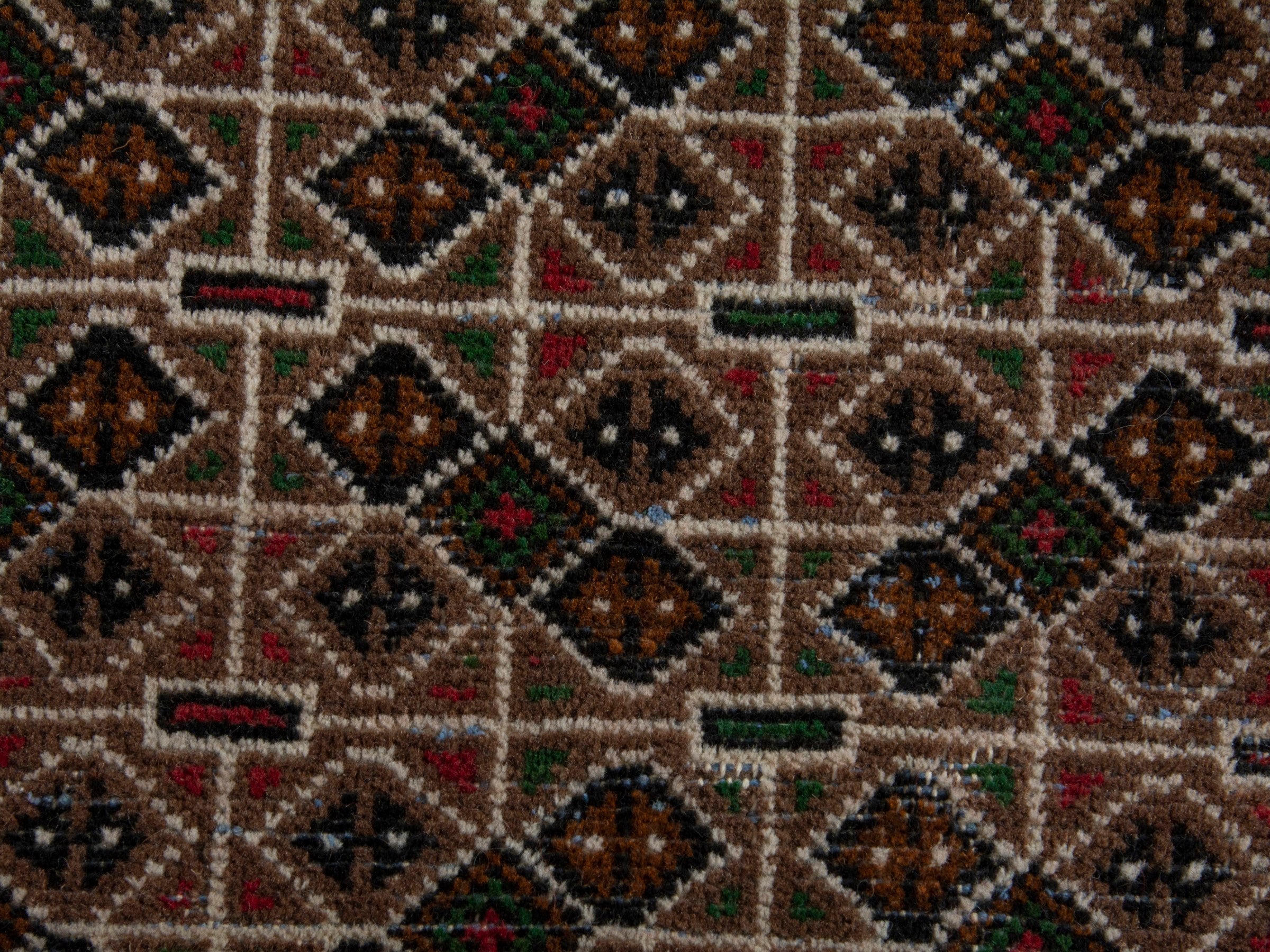 Persian Torkaman accent rug in dark brown and cream, view 5 of 6