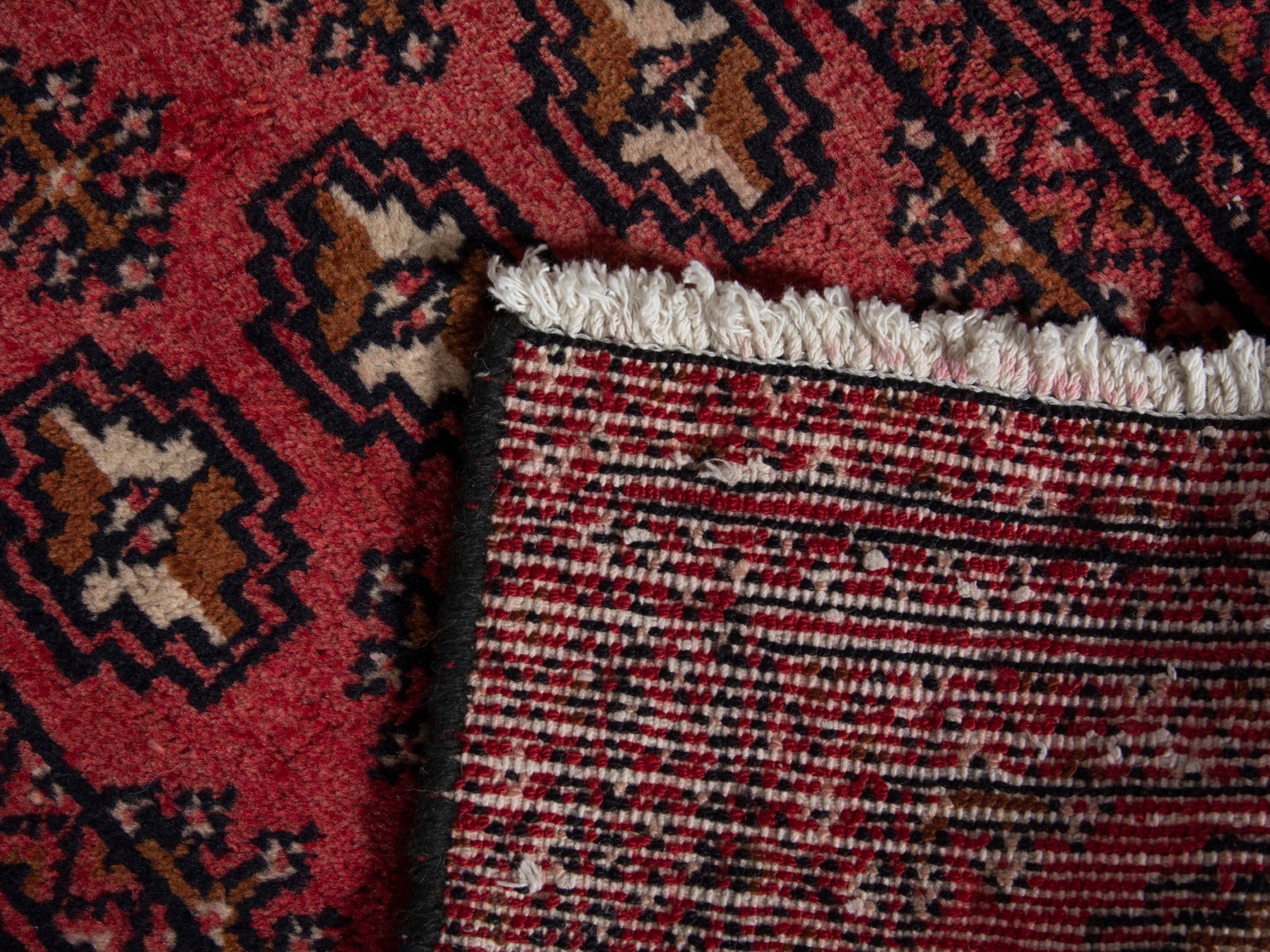 Persian Torkaman accent rug in faded red and black cherry, view 6 of 6