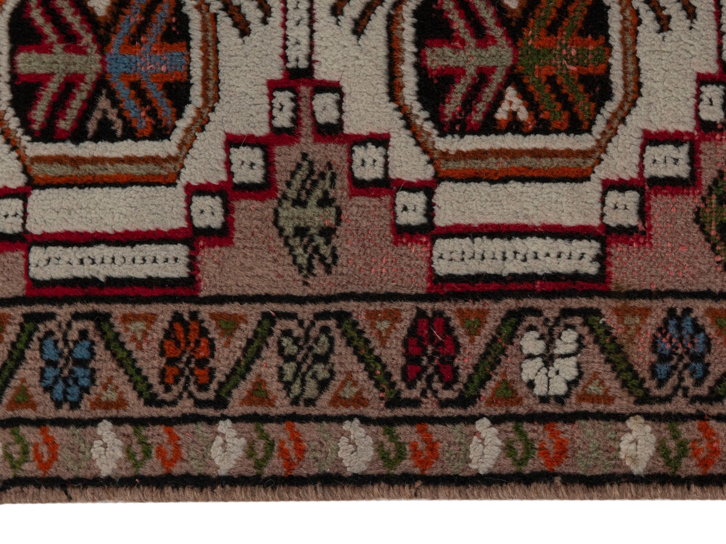 Persian Torkaman accent rug in muted pink and deep red, view 4 of 7