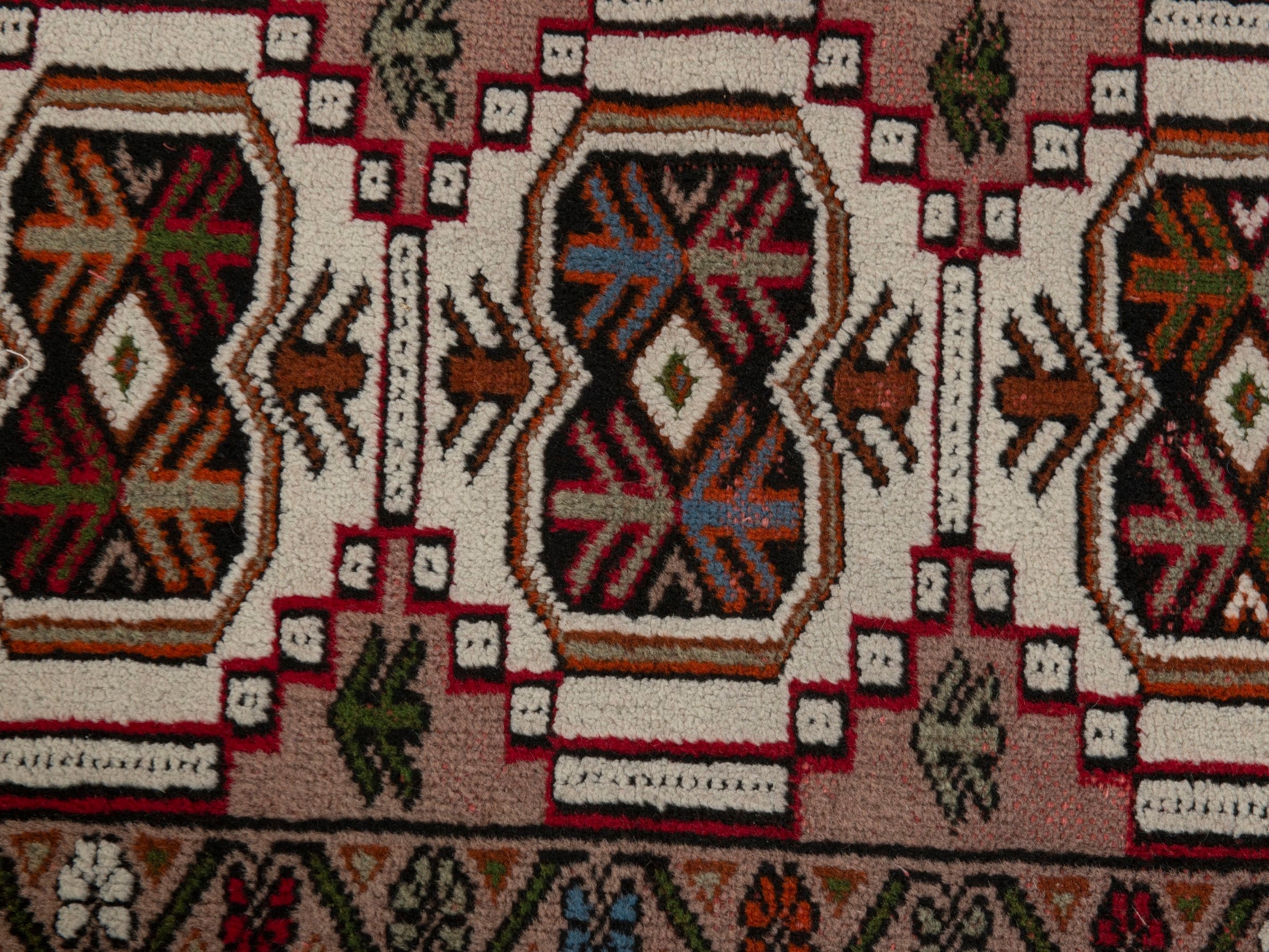 Persian Torkaman accent rug in muted pink and deep red, view 6 of 7