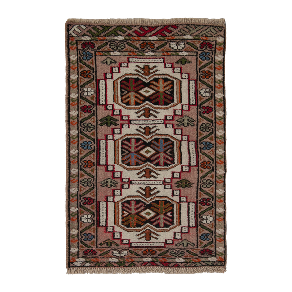 Persian Torkaman accent rug in muted pink and deep red, 1'10" x 2'11"