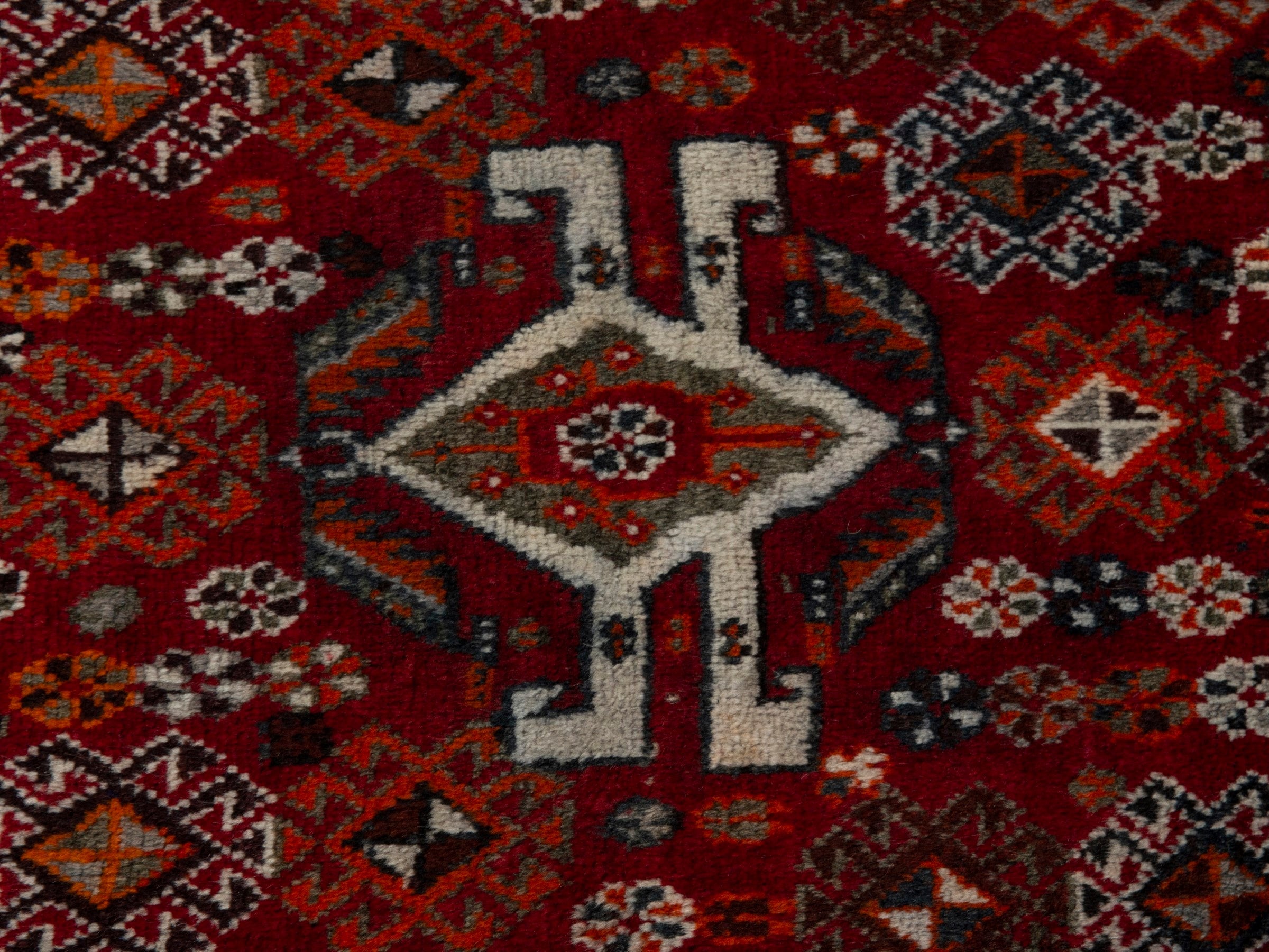 Persian Shiraz accent rug in deep red and cream, view 5 of 6