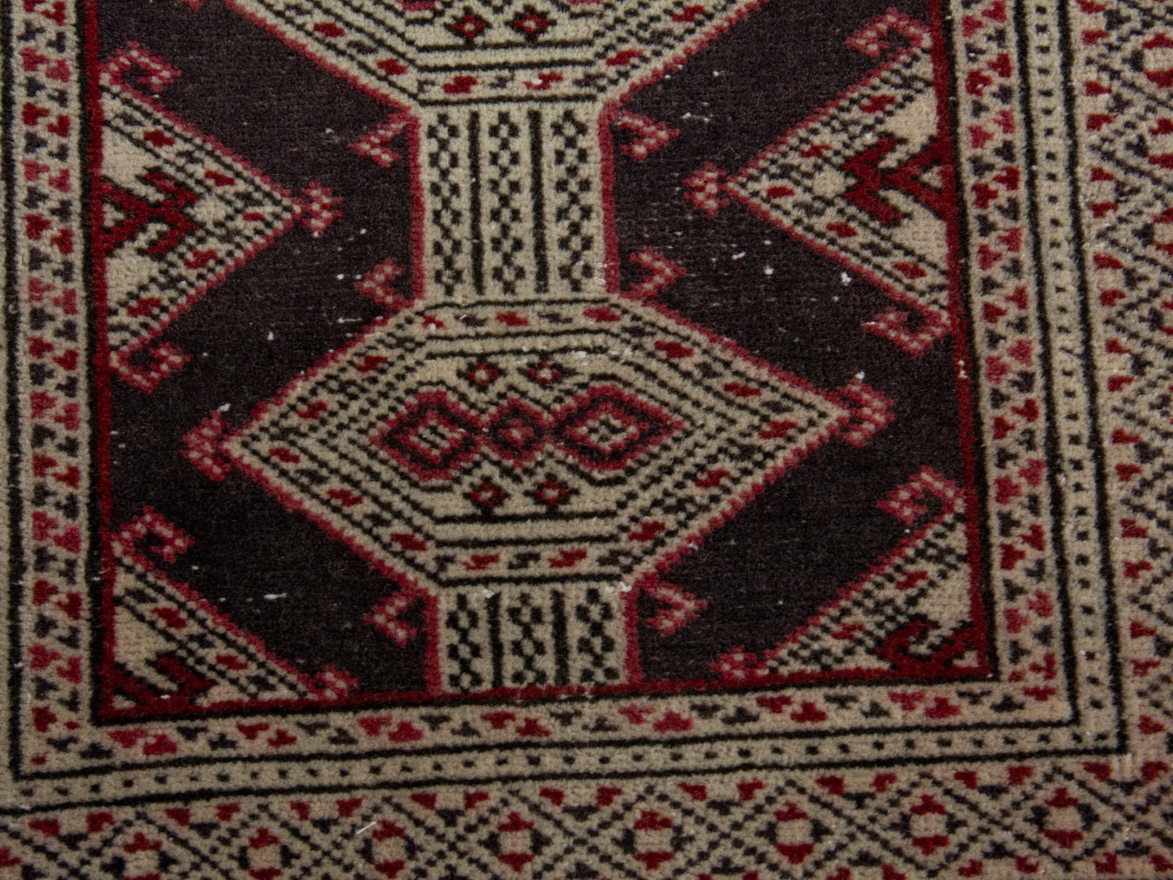 Persian Torkaman accent rug in cream and burgundy, view 6 of 7