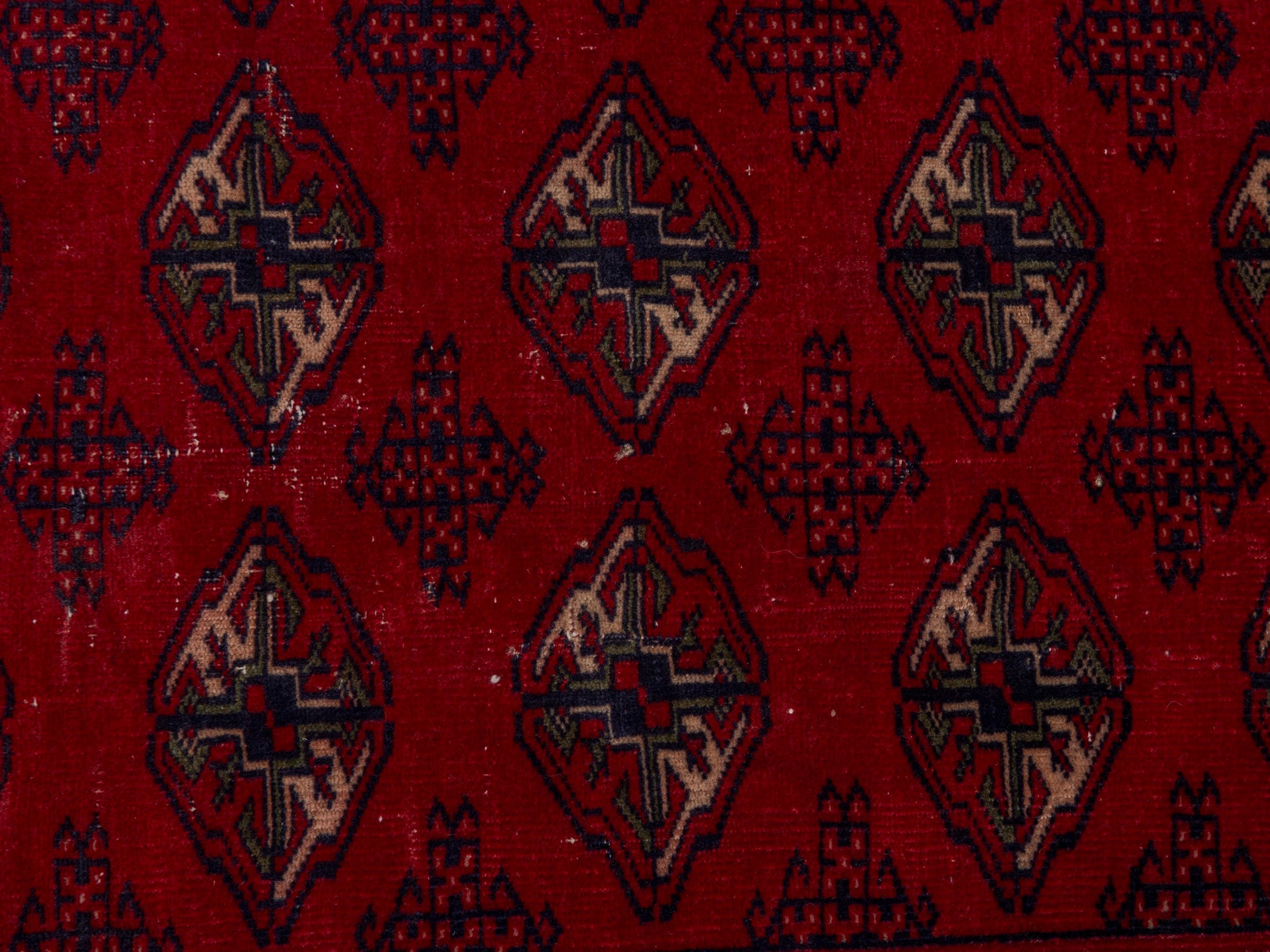 Persian Torkaman accent rug in deep red and burgundy, view 6 of 7