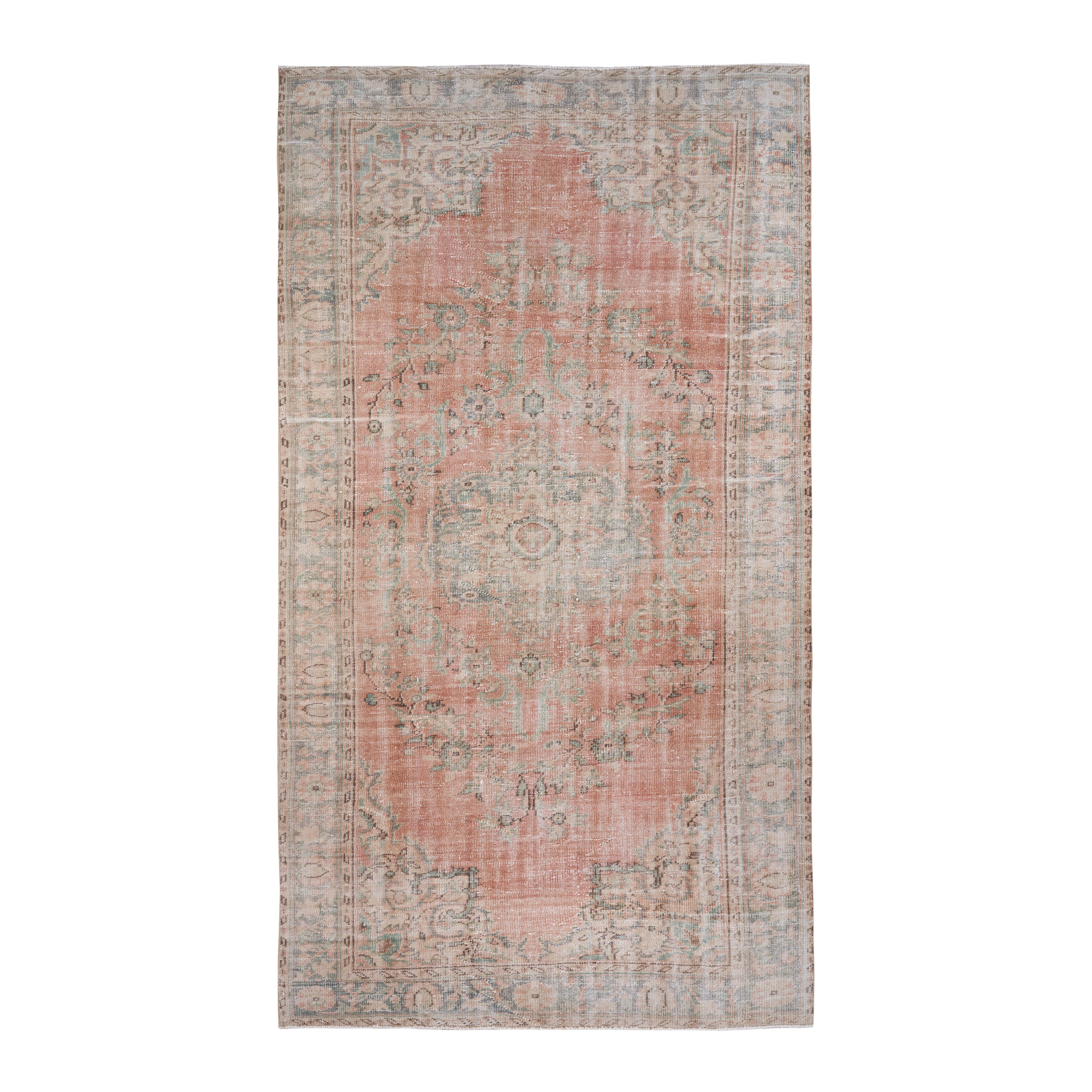 Turkish Manisa area rug in muted pink and rose, 5'9" x 10'