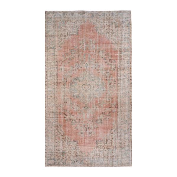Turkish Manisa area rug in muted pink and rose, 5'9" x 10'