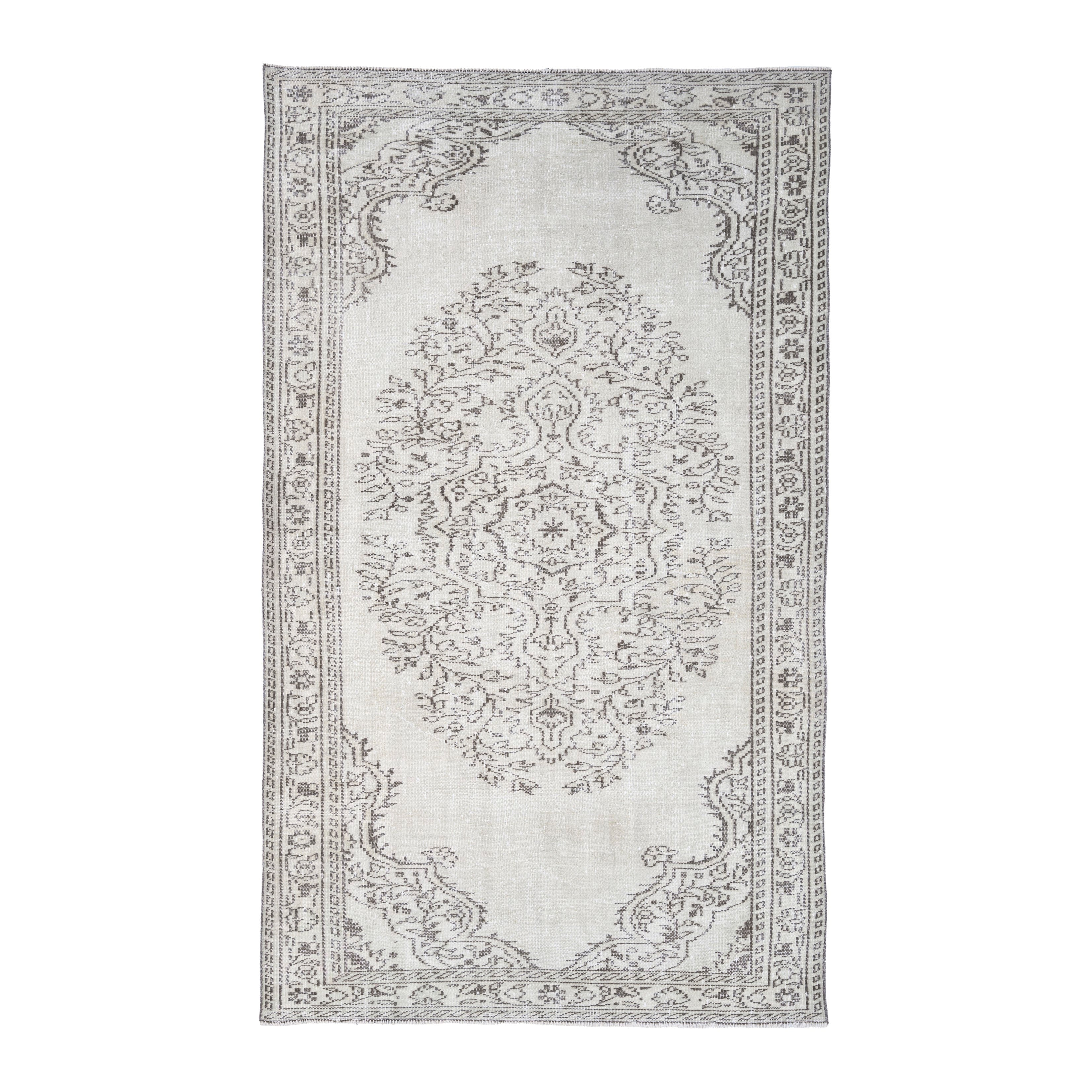 Turkish Manisa area rug in ivory and greige, 5'4" x 8'11"