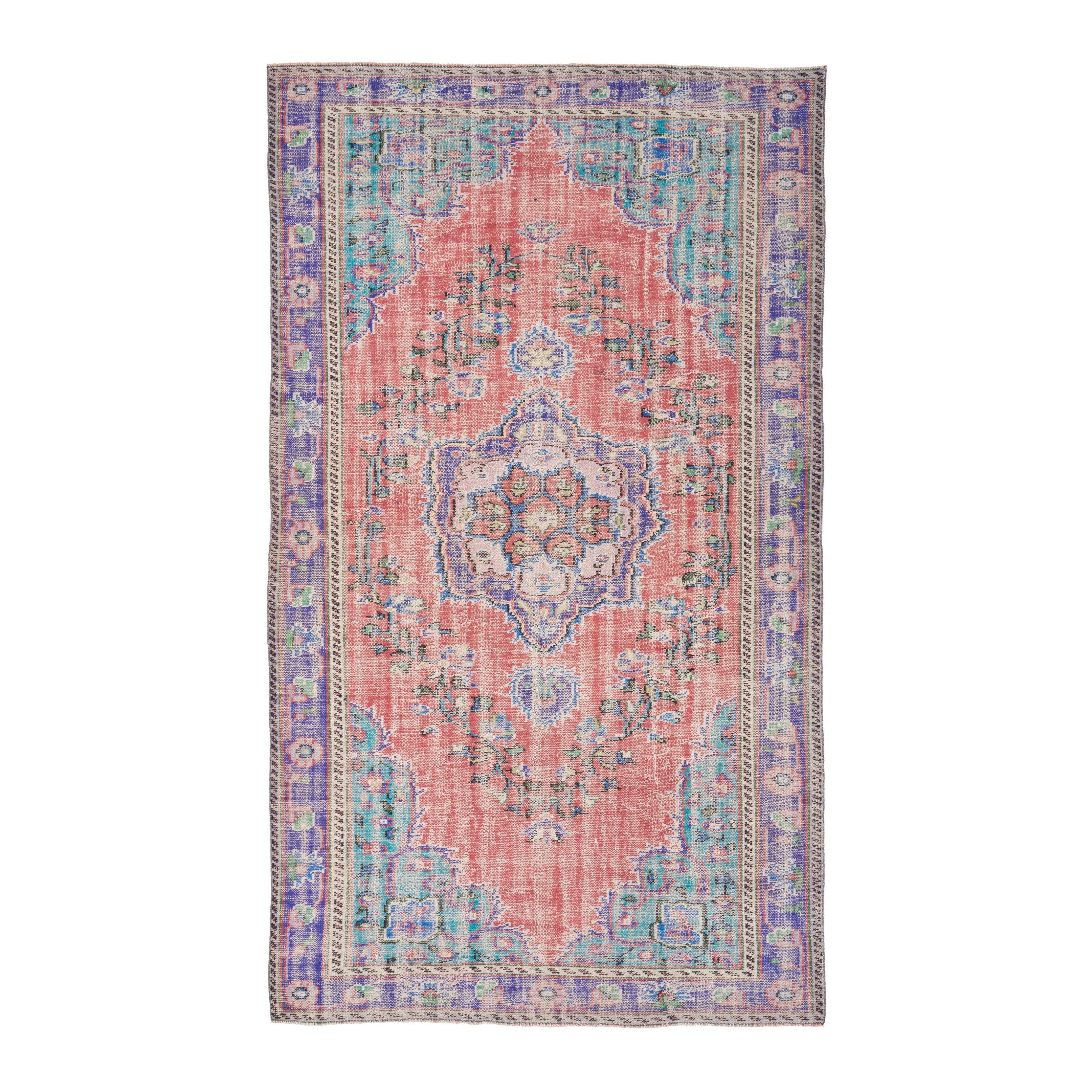 Turkish Manisa area rug in faded red and plum, 5'7" x 9'7"
