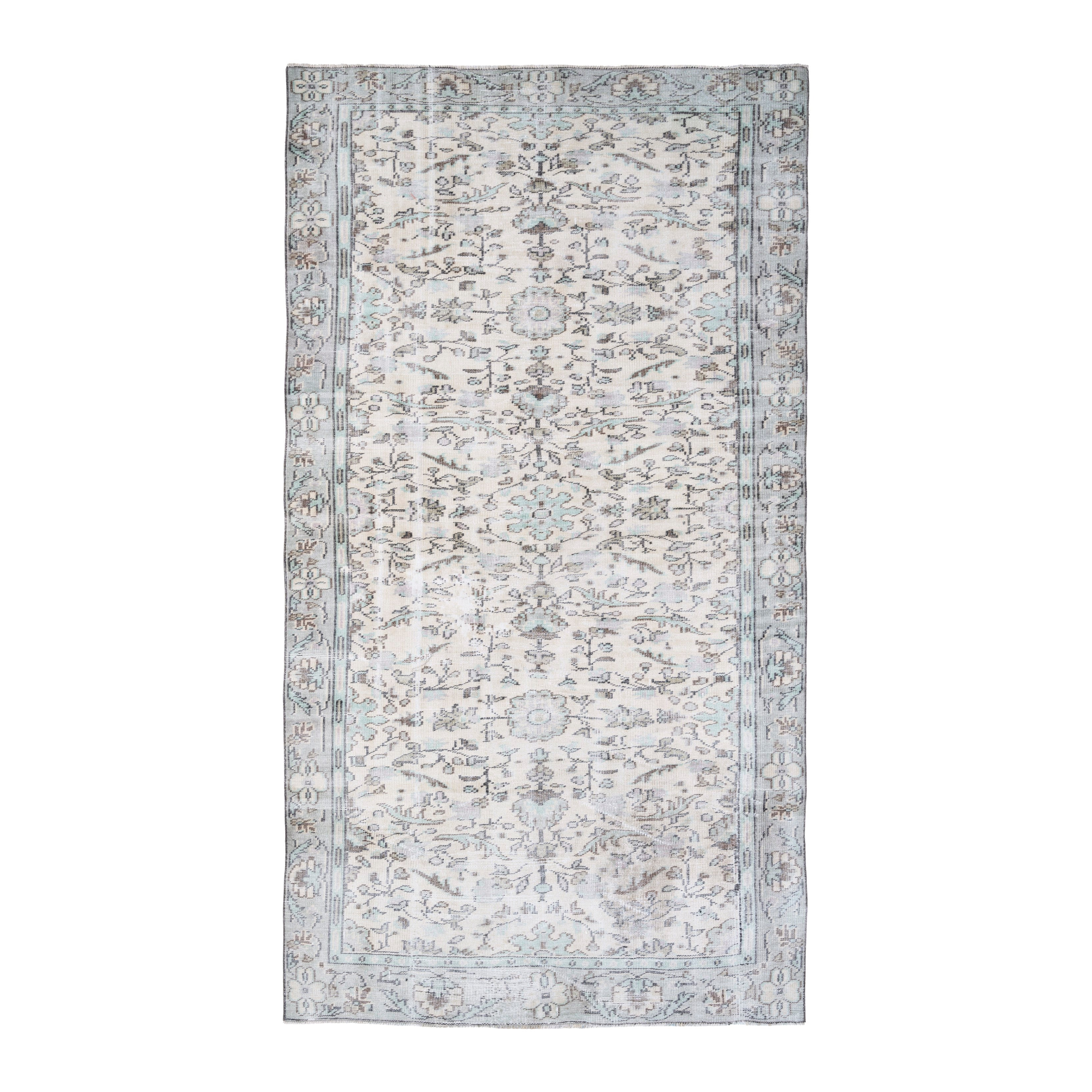 Turkish Manisa area rug in ivory and greige, 5'7" x 10'2"