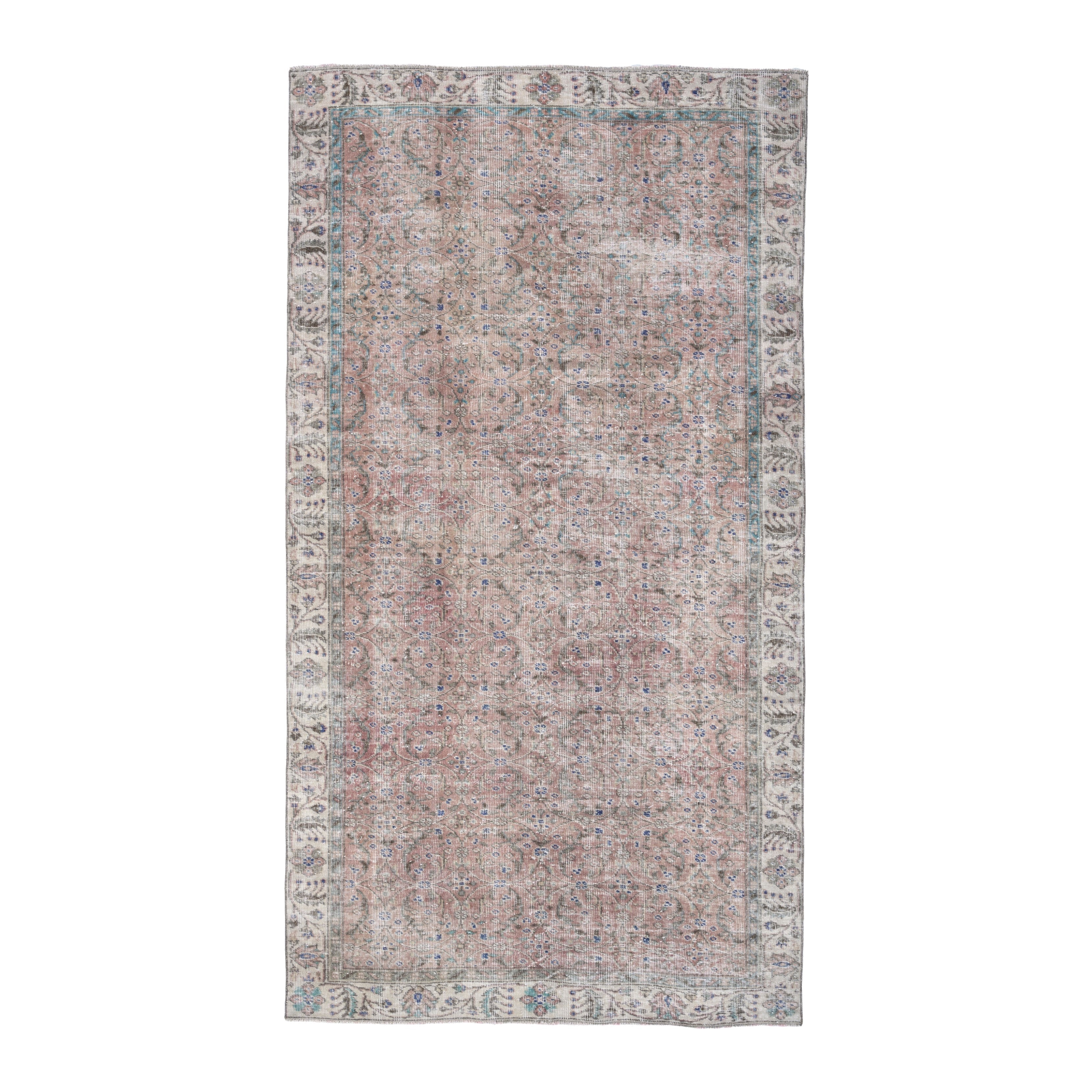 Turkish Isparta area rug in faded red and cream, 5'1" x 8'10"