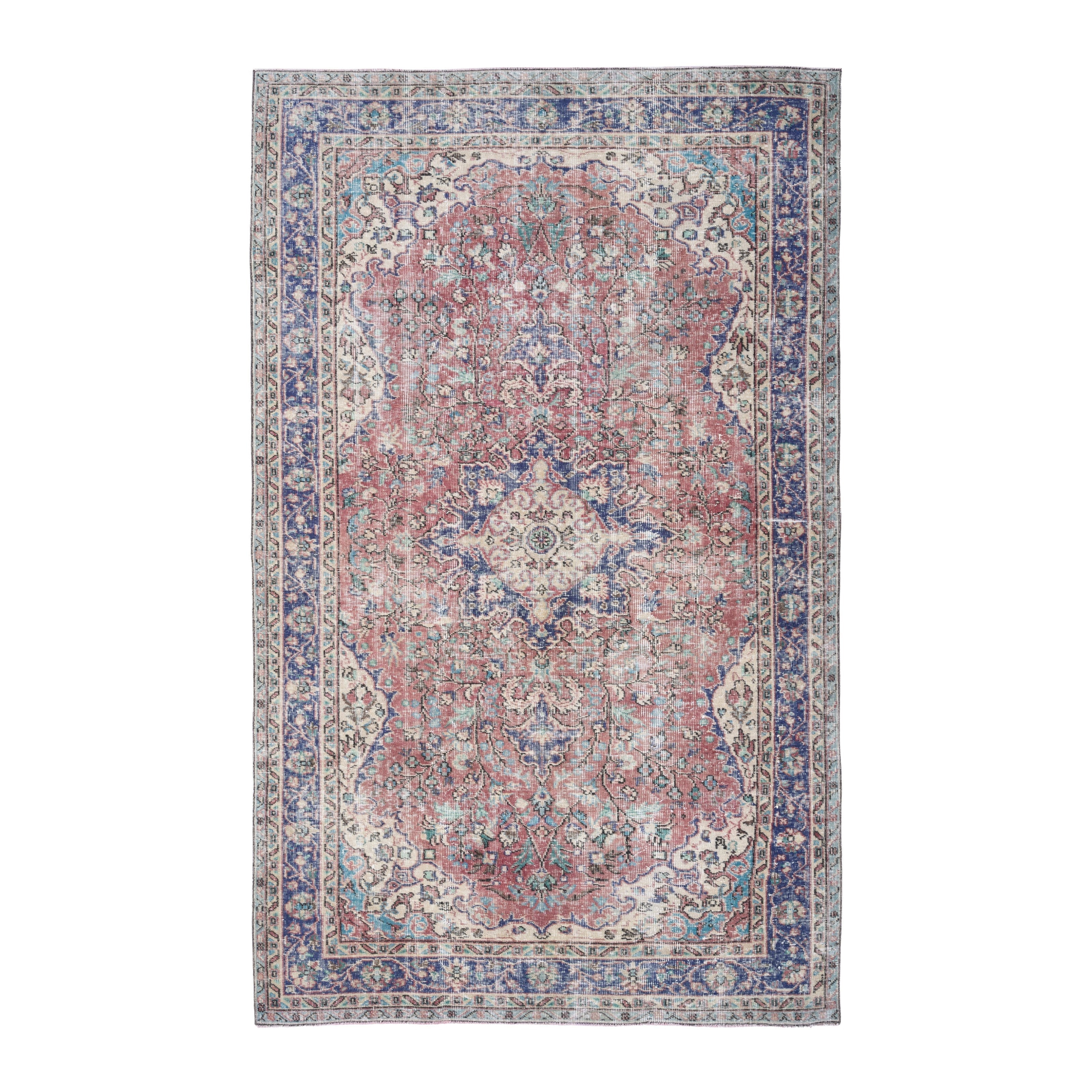 Turkish Isparta area rug in faded red and deep indigo, 5'5" x 8'8"