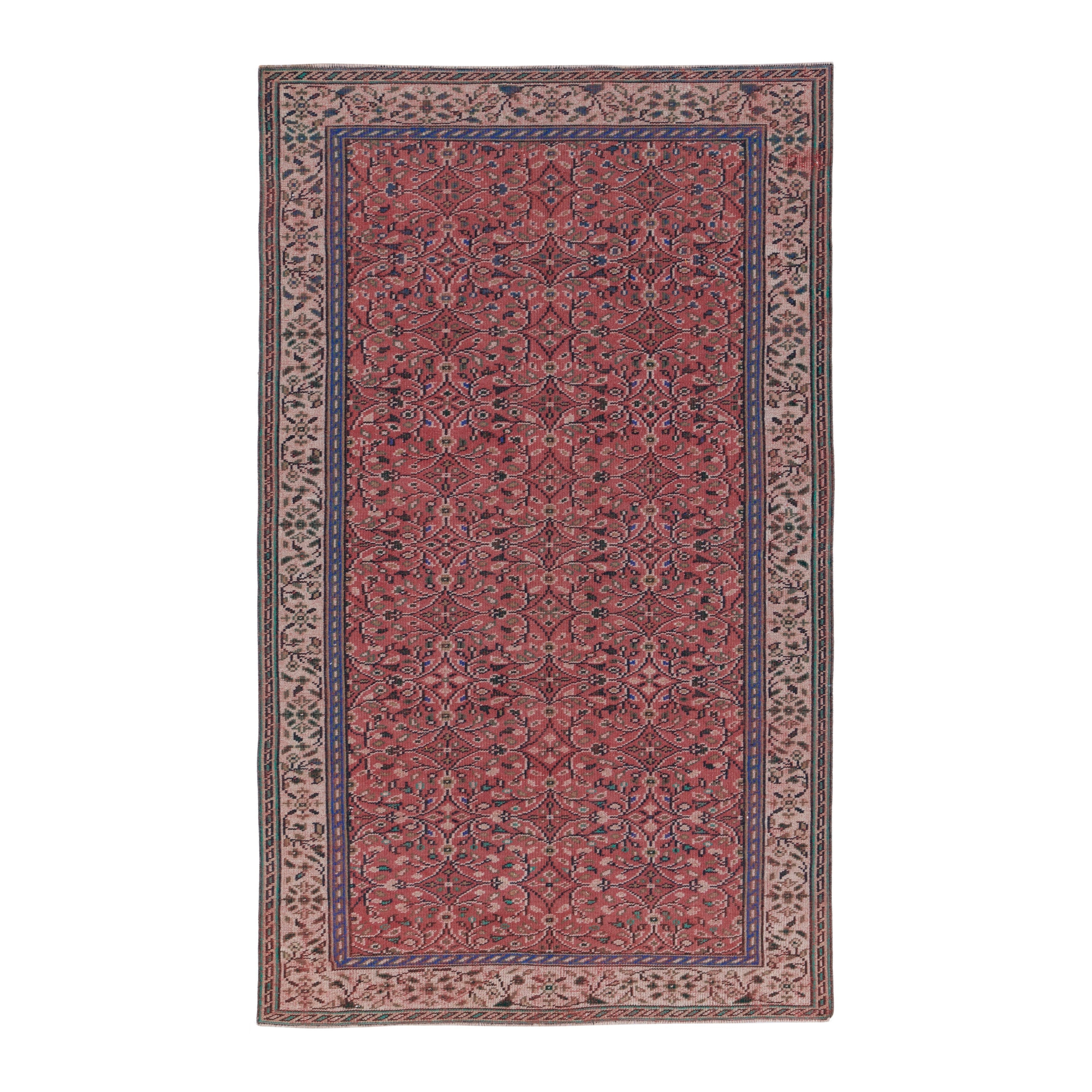 Turkish Manisa area rug in rust and muted pink, 5'4" x 8'10"