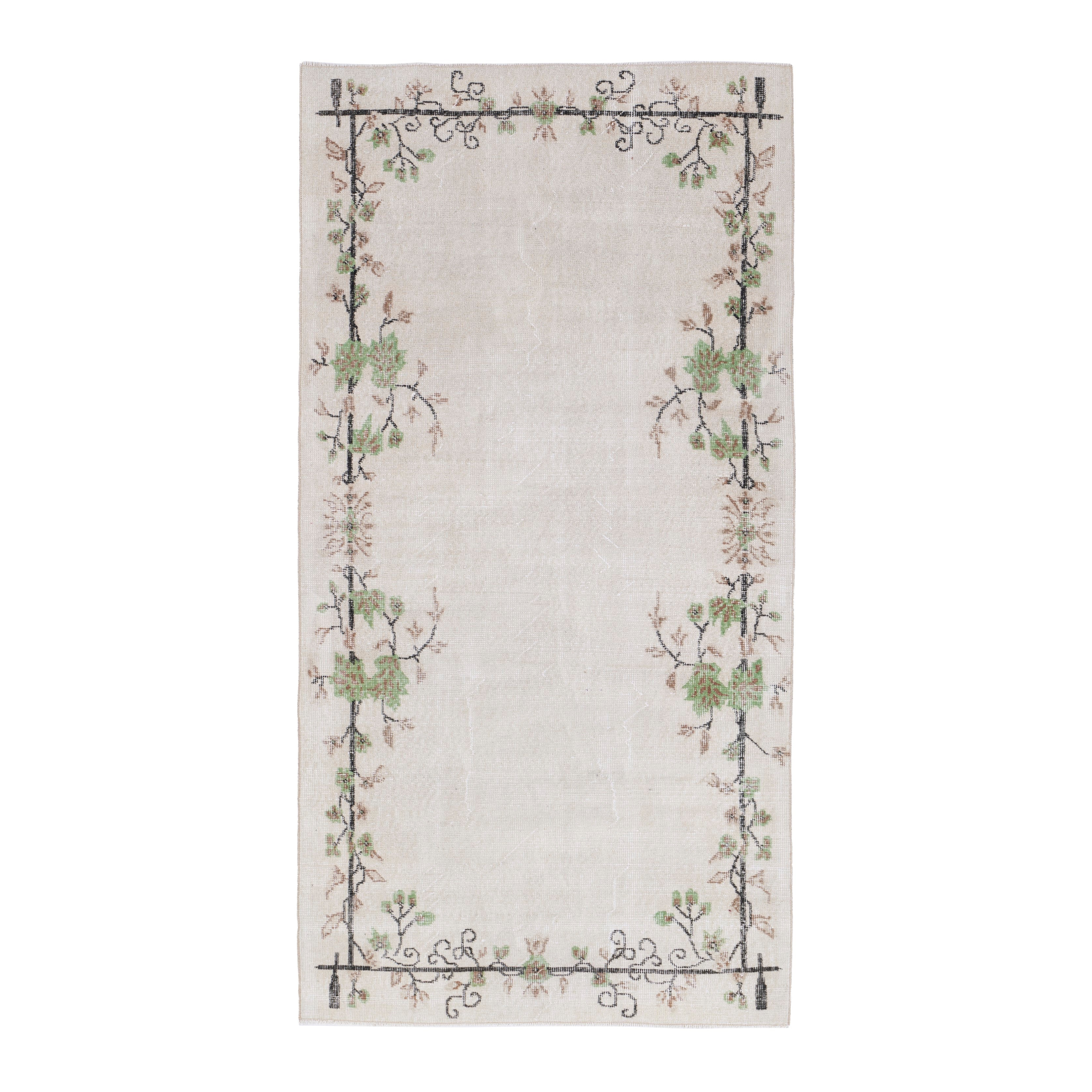 Turkish Isparta area rug in cream and sage, 3'9" x 7'2"
