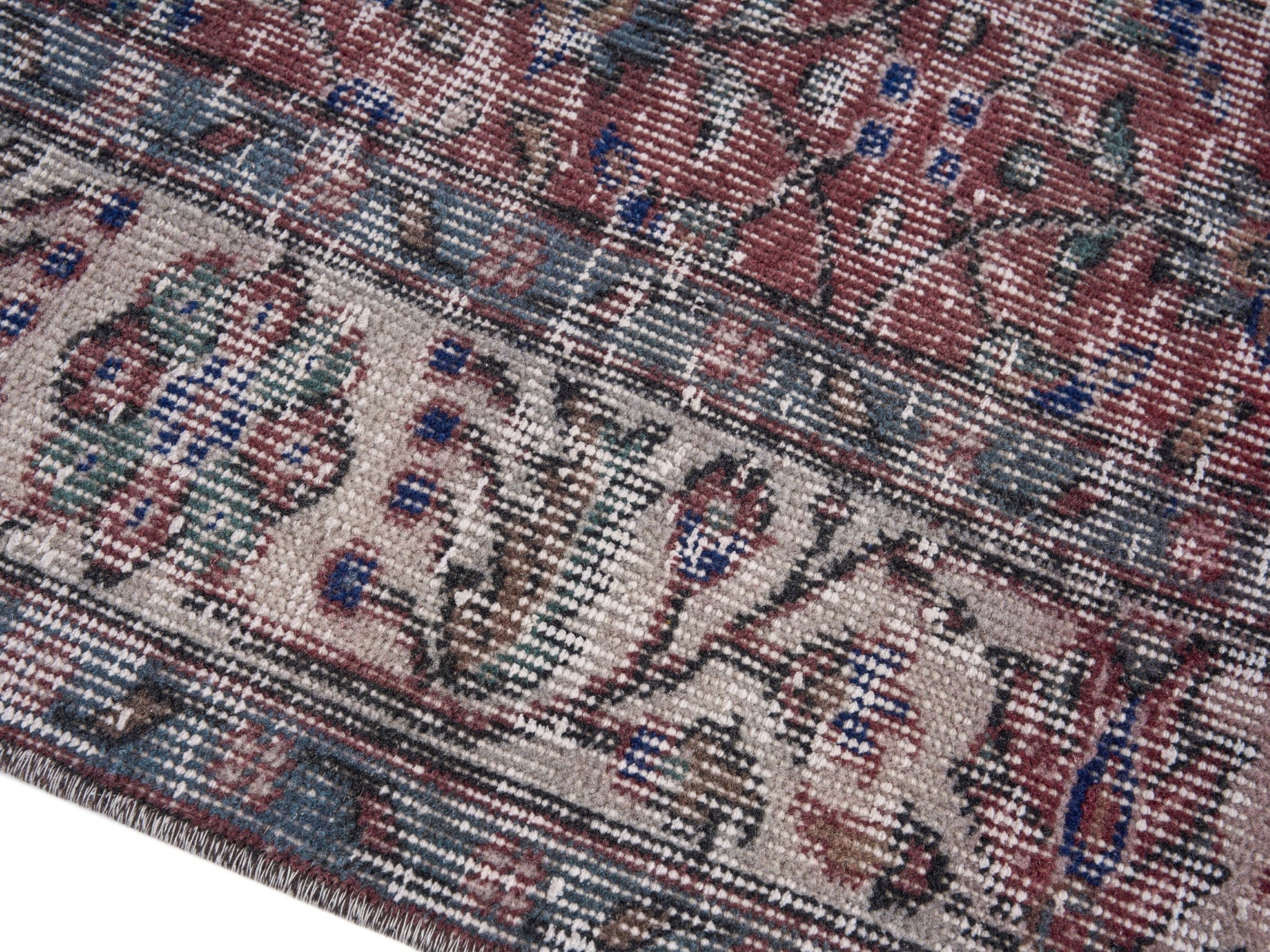 Turkish Isparta area rug in faded red and cream, view 6 of 10