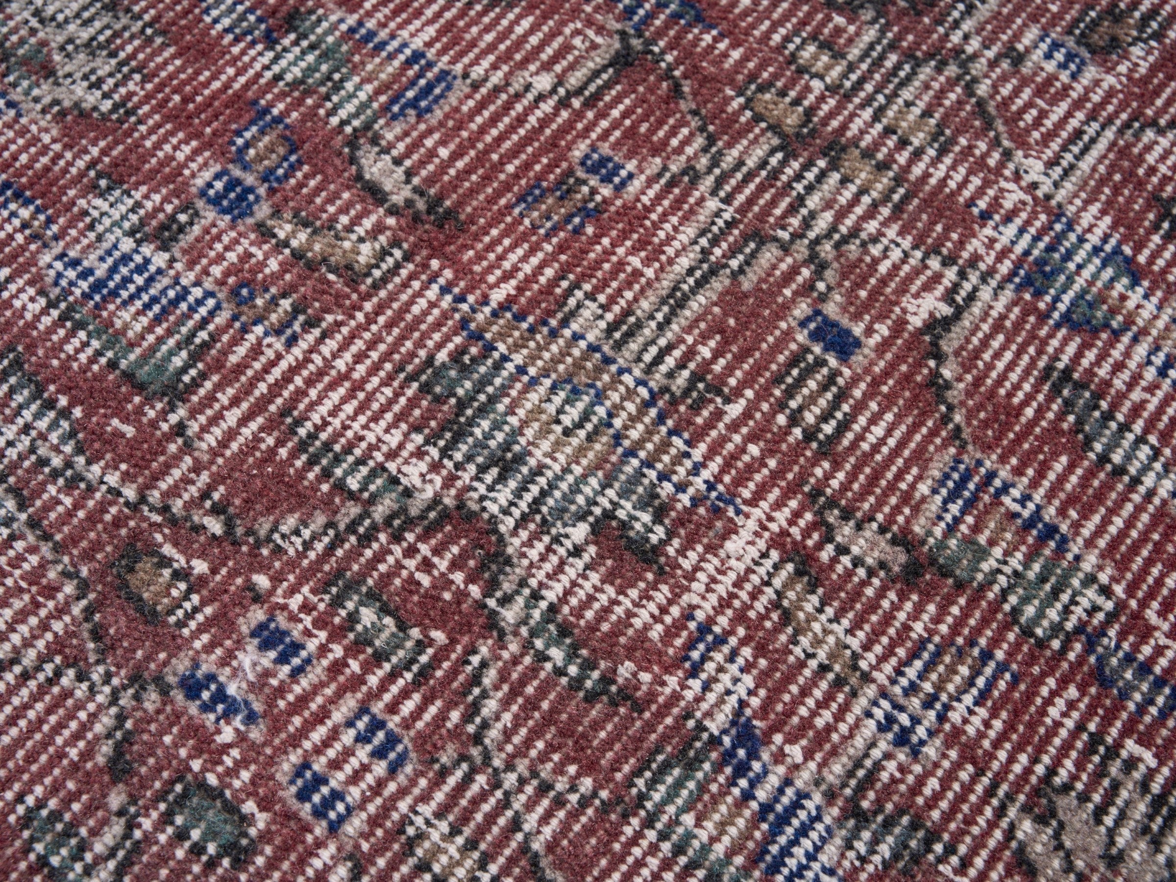 Turkish Isparta area rug in faded red and cream, view 7 of 10