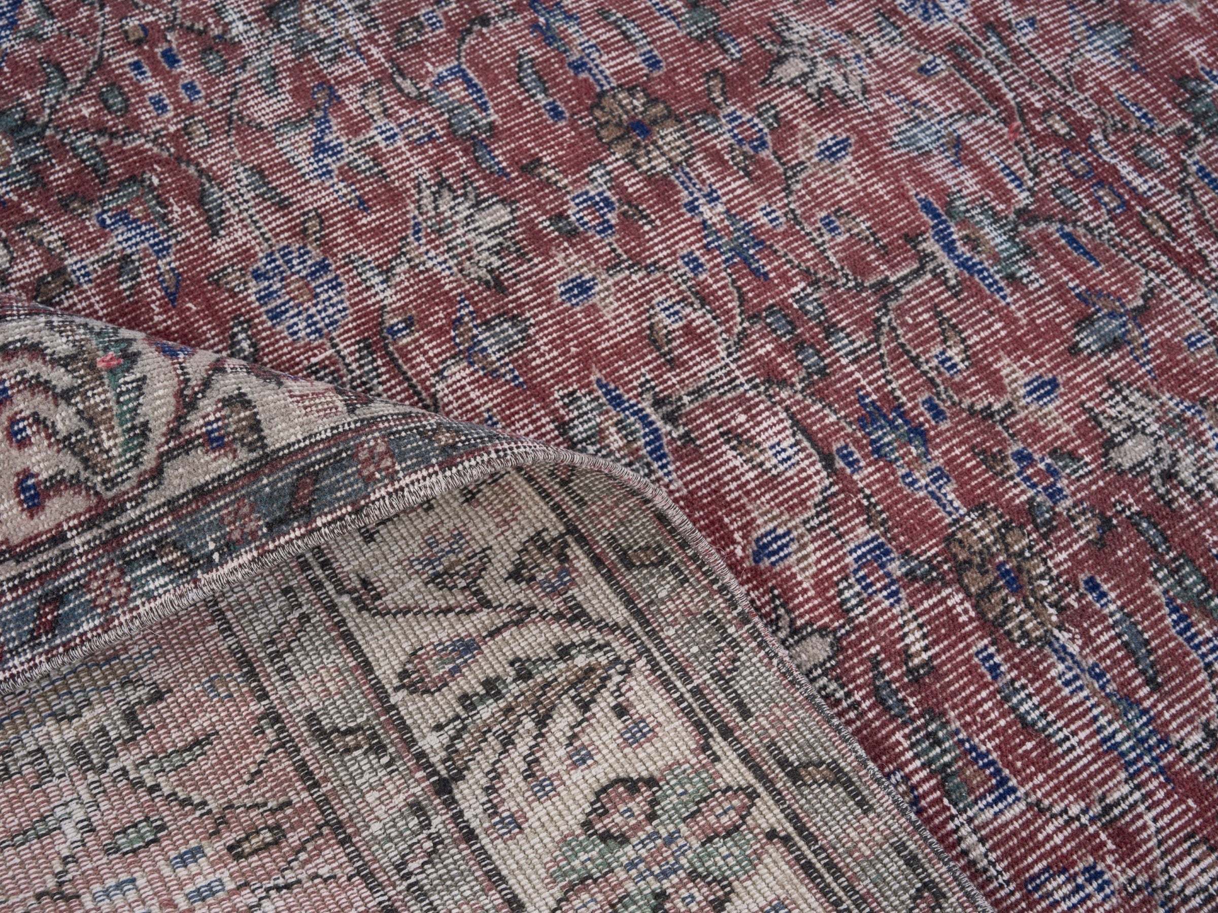 Turkish Isparta area rug in faded red and cream, view 9 of 10