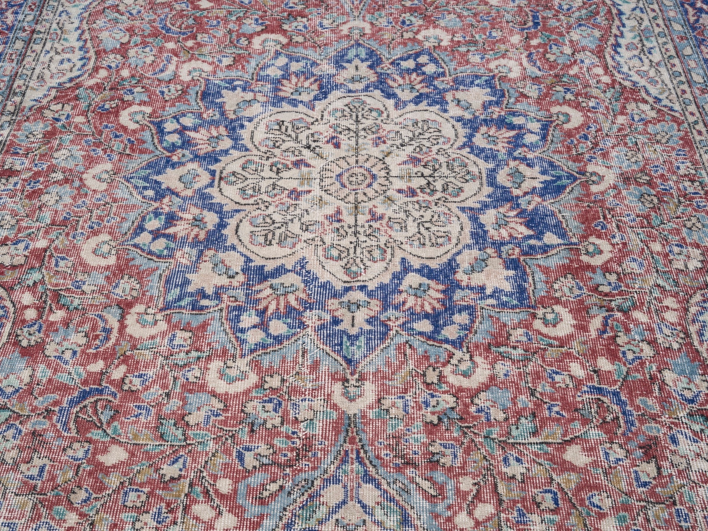 Turkish Isparta area rug in faded red and navy, view 4 of 10