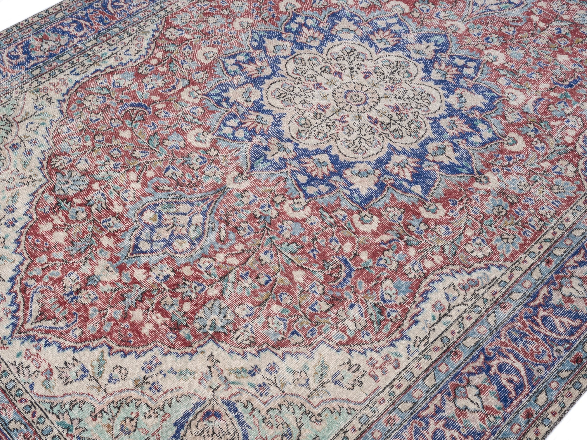 Turkish Isparta area rug in faded red and navy, view 5 of 10