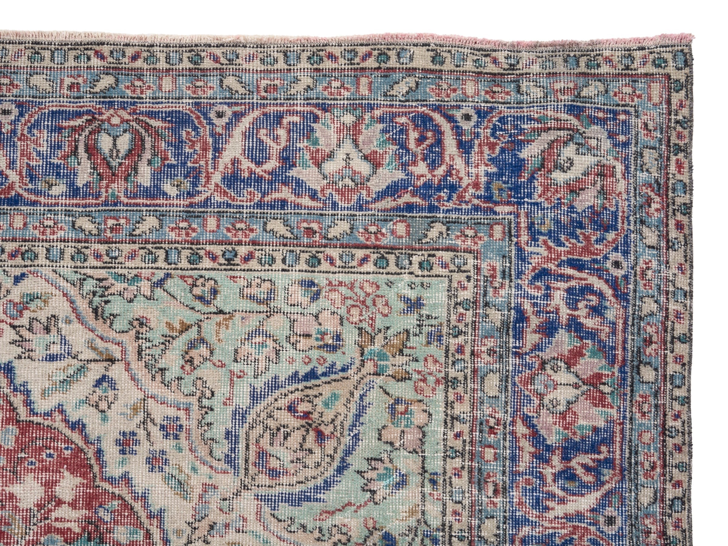 Turkish Isparta area rug in faded red and navy, view 9 of 10