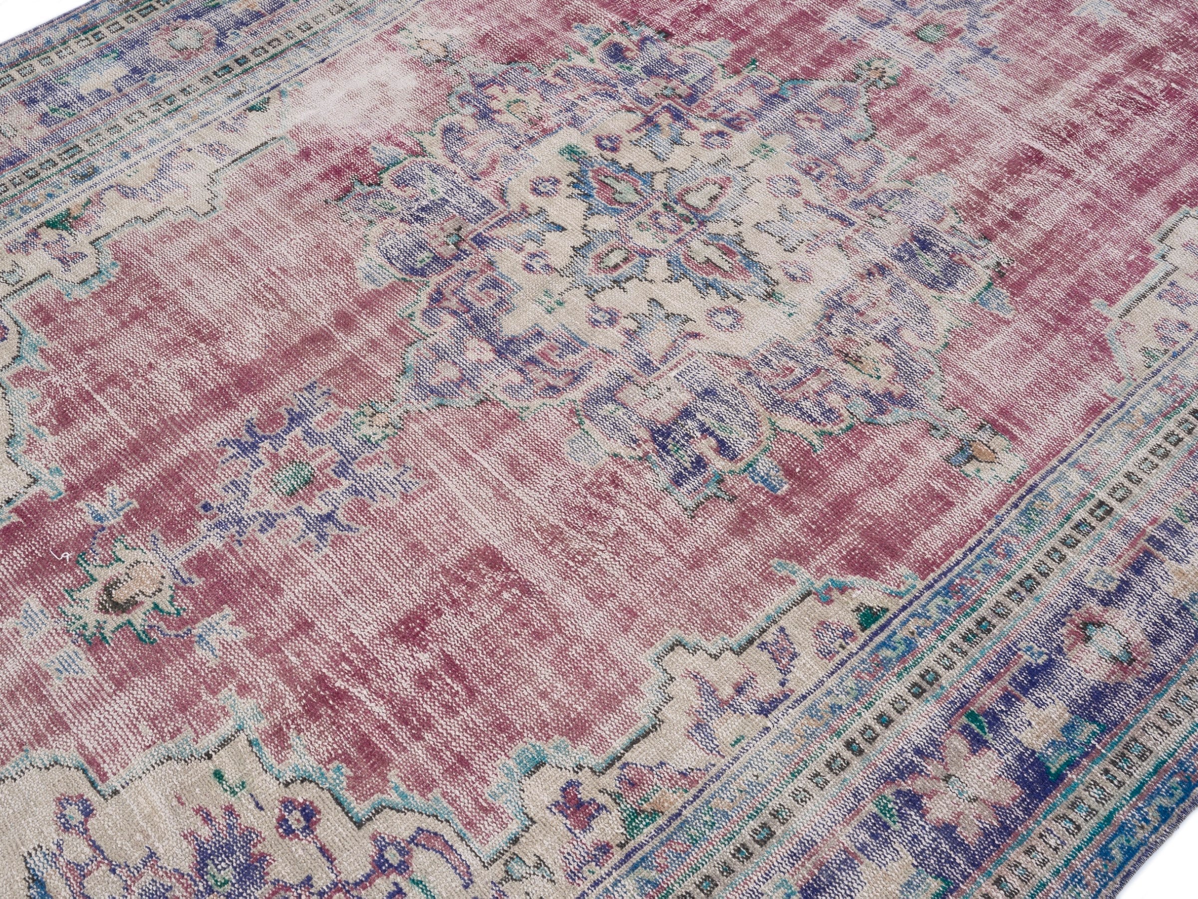 Turkish Manisa oversized rug in dusty rose and navy, view 5 of 10