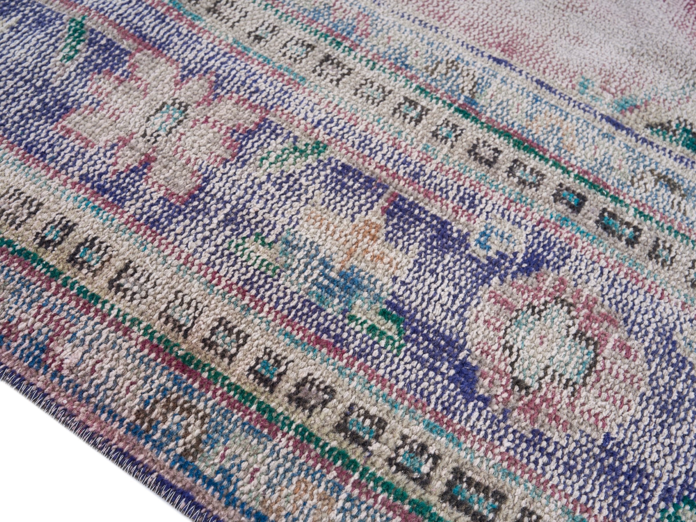 Turkish Manisa oversized rug in dusty rose and navy, view 6 of 10